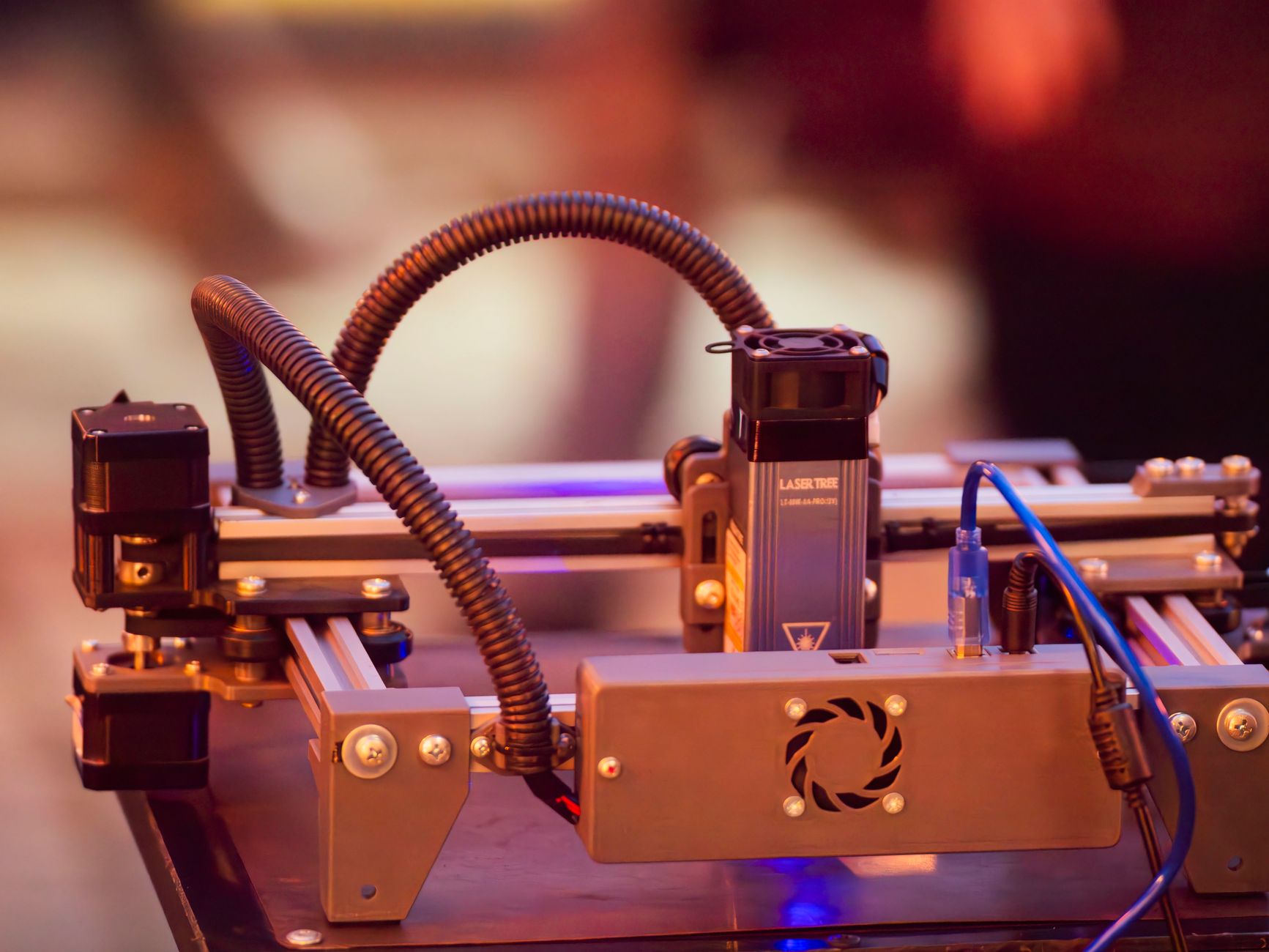 Detailed view of a 3D printer operating in Wrocław, Poland, highlighting modern technology and innovation.