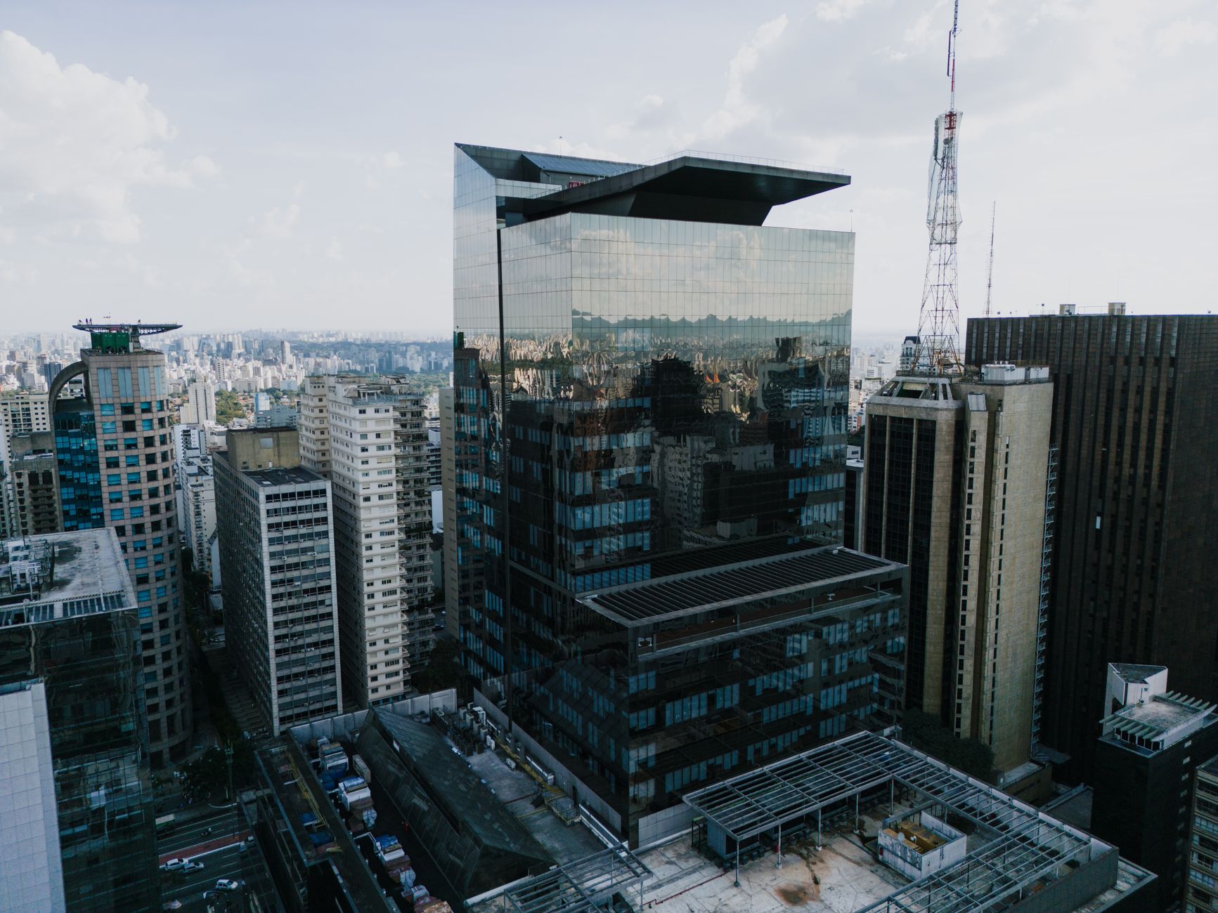 Aerial view of modern skyscrapers in Bela Vista, São Paulo, showcasing urban architecture.