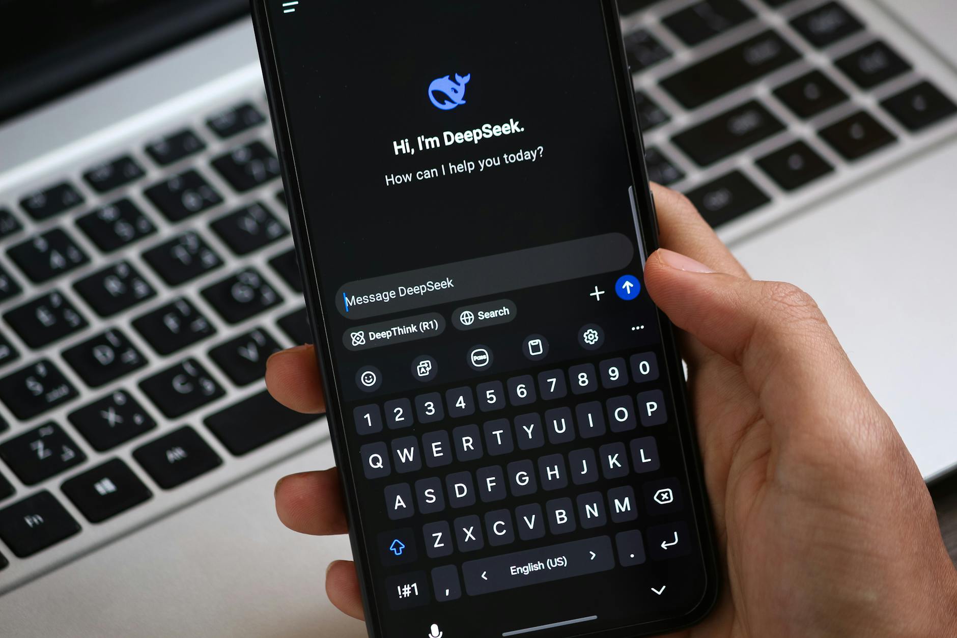 Scrabble tiles spelling out Google and Gemini on a wooden table, focusing on AI concepts.