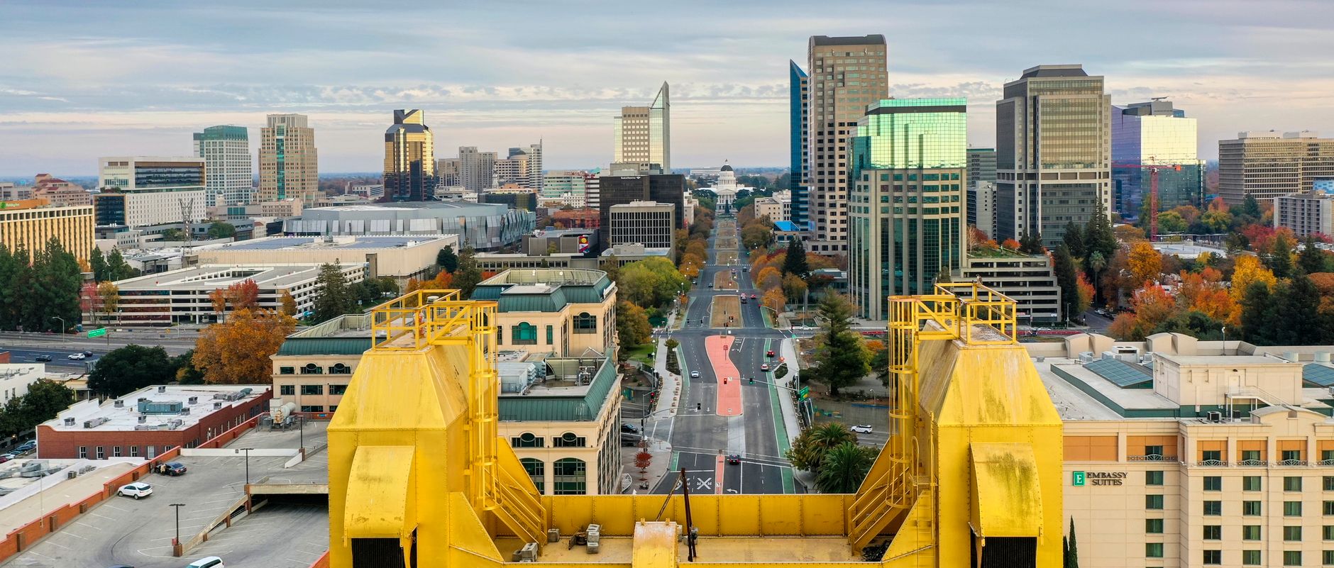 Aerial view of Sacramento's skyline featuring the Tower Bridge and cityscape in autumn.
