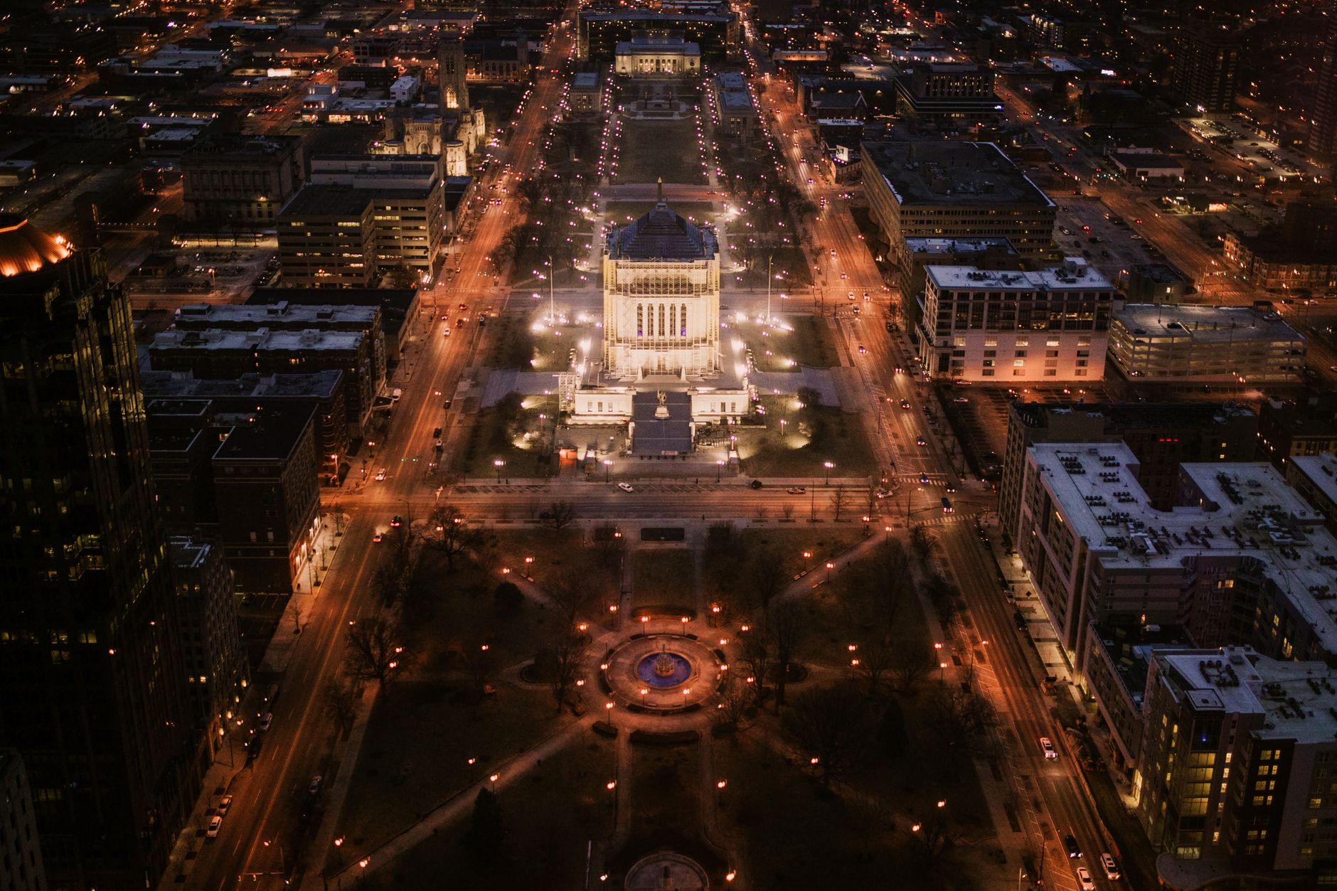 Breathtaking aerial night view of downtown Indianapolis featuring city lights and urban architecture.