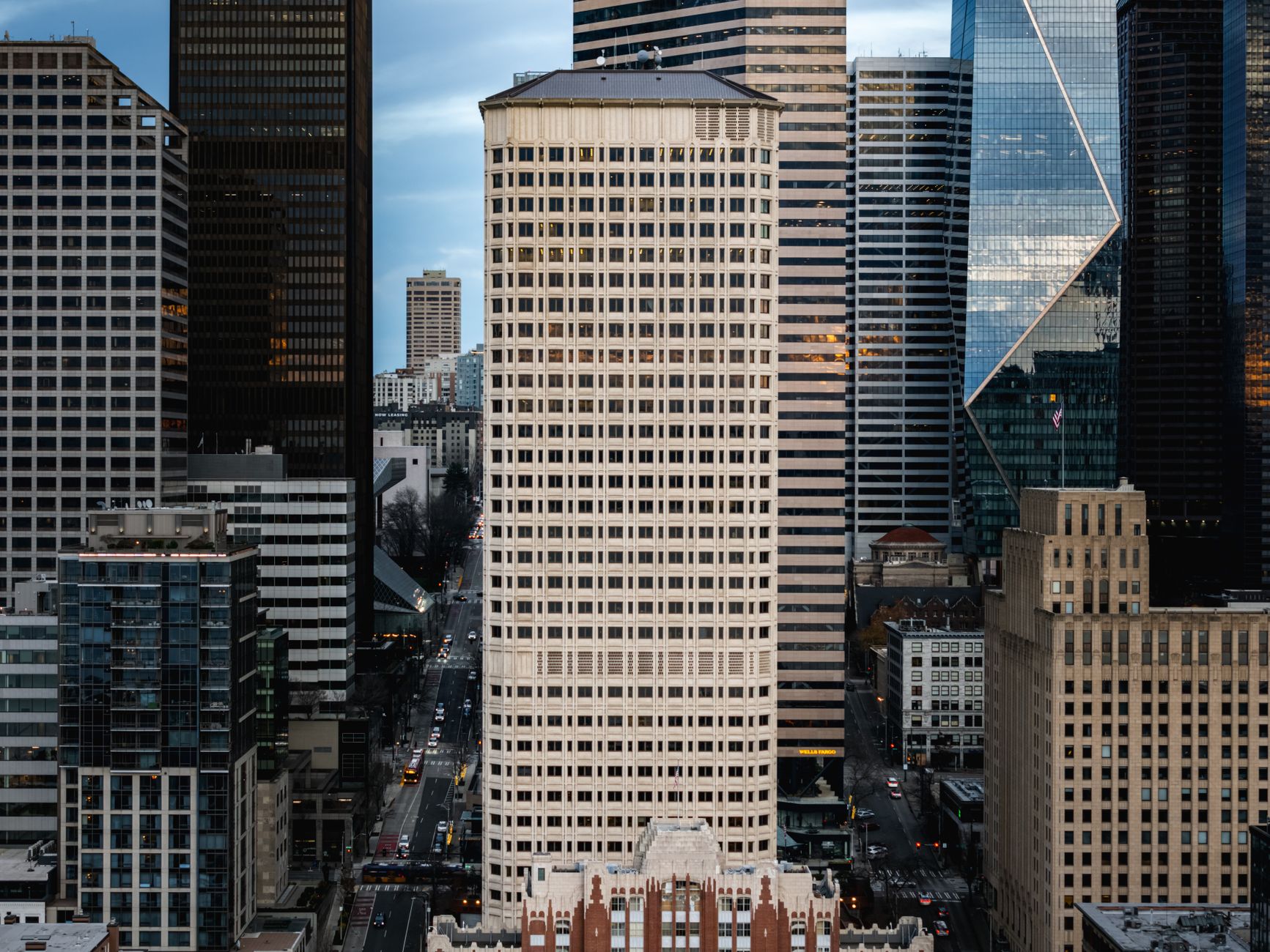 Stunning aerial view of Seattle's downtown skyscrapers, showcasing modern and classic architecture at dusk.