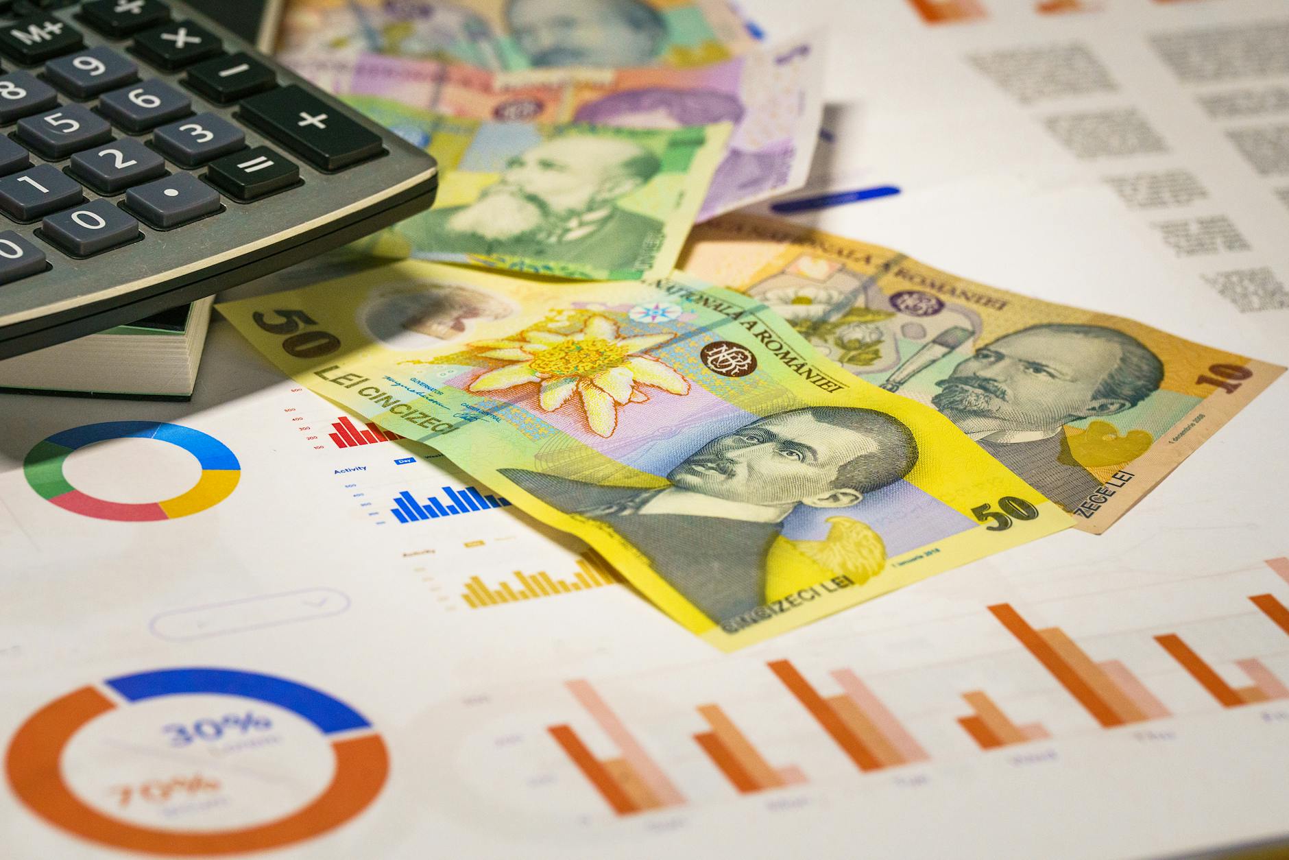 Hand holding a smartphone with AI chatbot app, emphasizing artificial intelligence and technology.