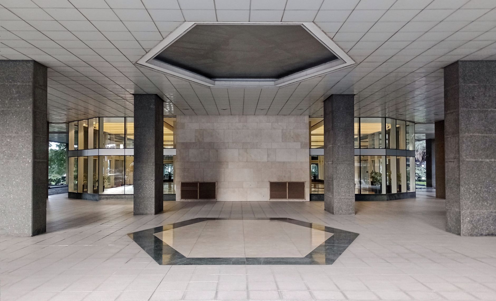 Contemporary lobby entrance with glass and columns in Buenos Aires, Argentina.