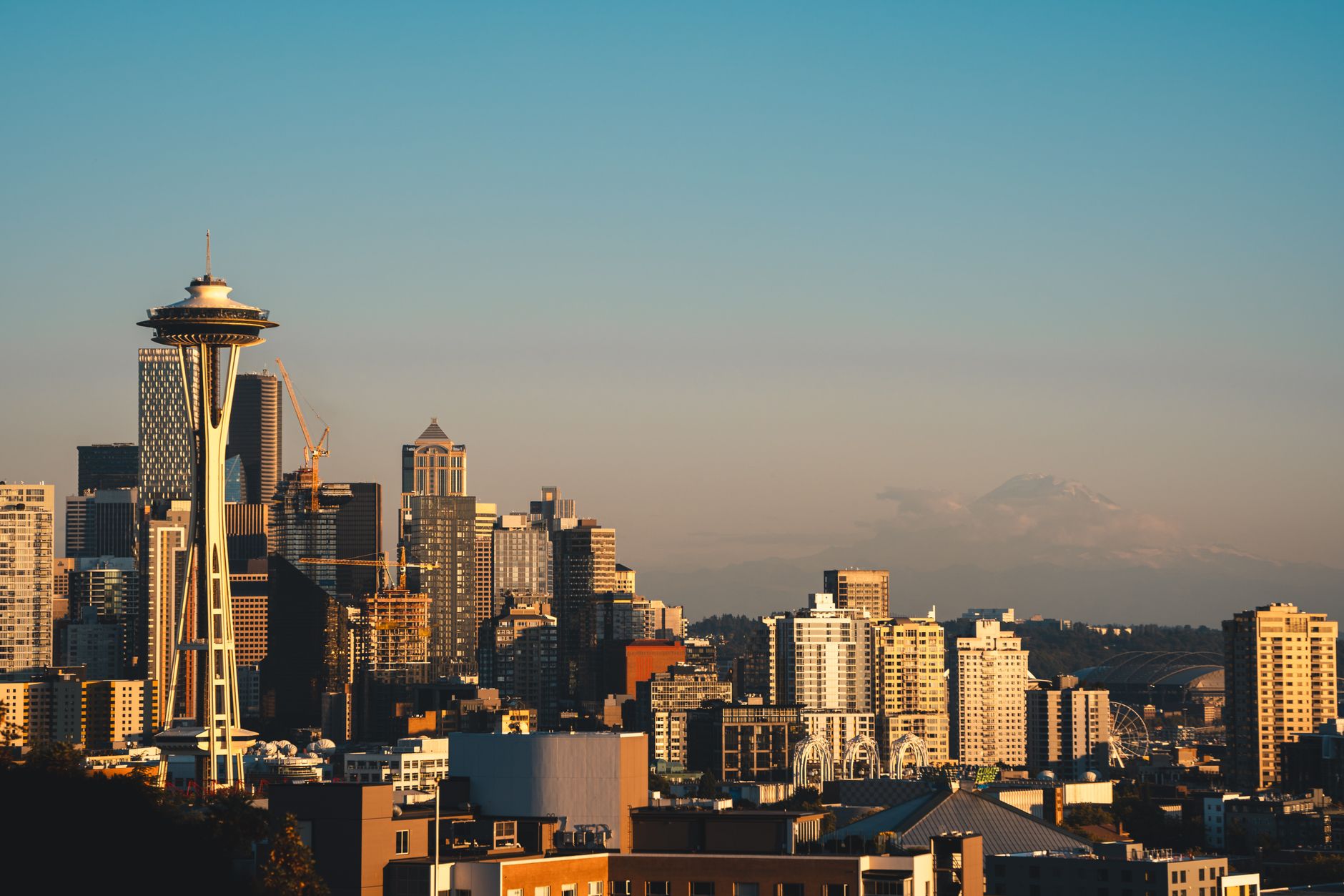 Stunning view of Seattle's skyline featuring the iconic Space Needle during sunset.
