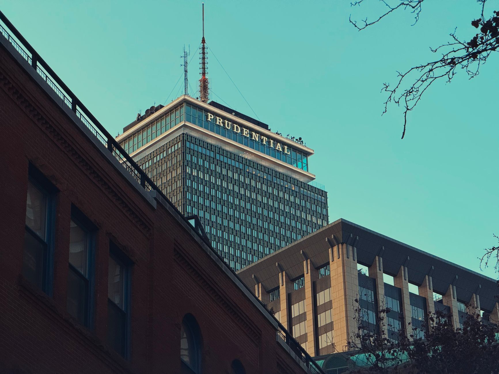 Architectural view of Boston's Prudential Tower during the day.