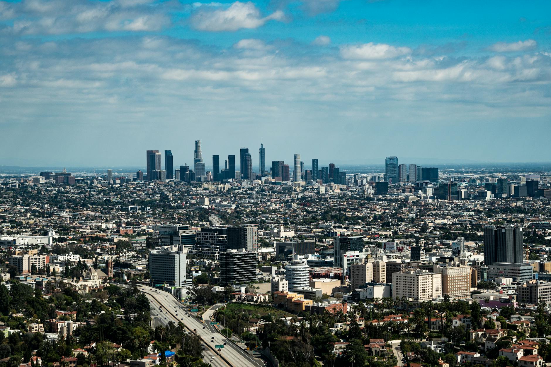Los Angeles skyline with business professionals meeting