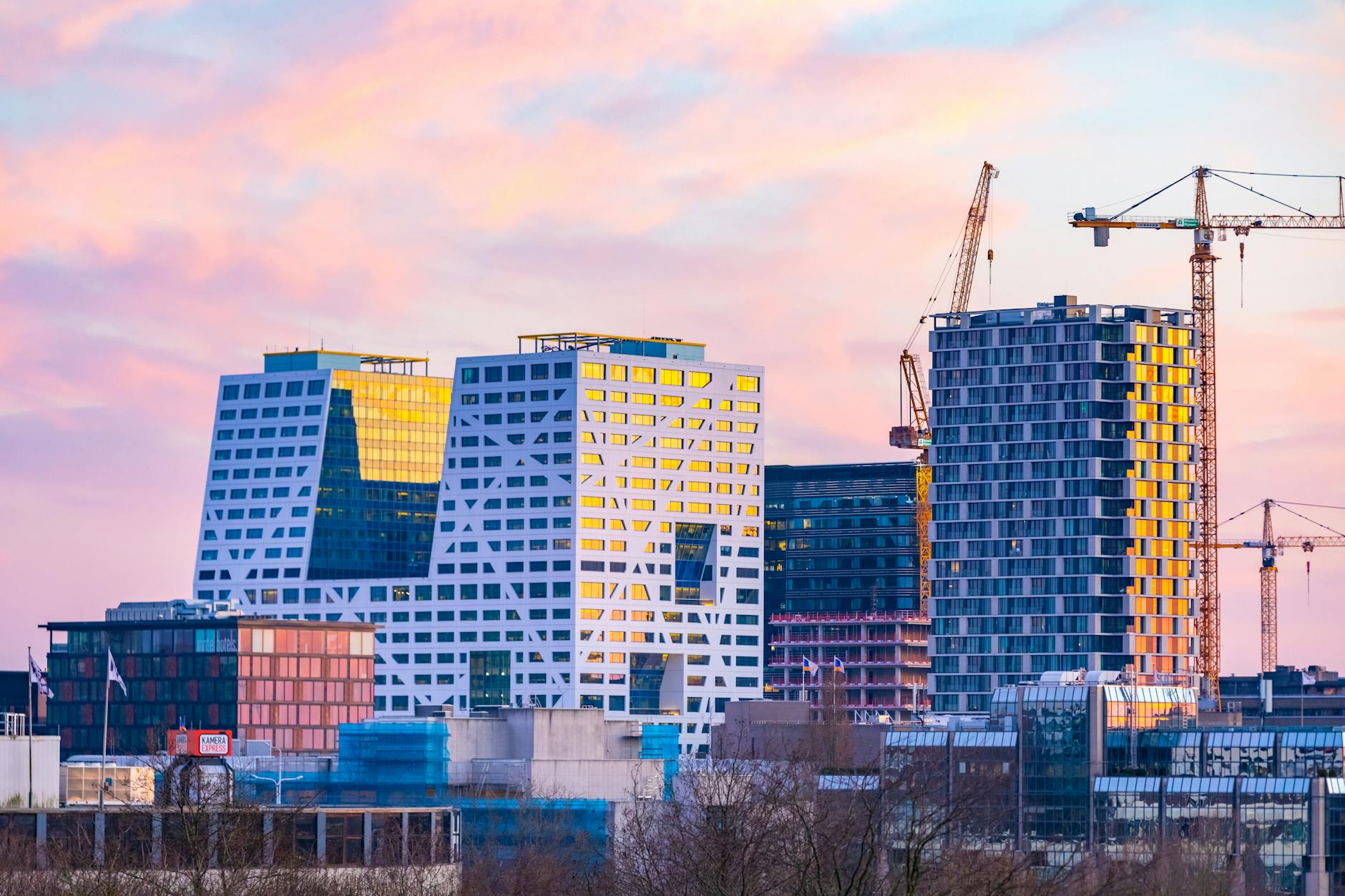 Oklahoma City skyline with energy rigs and modern buildings