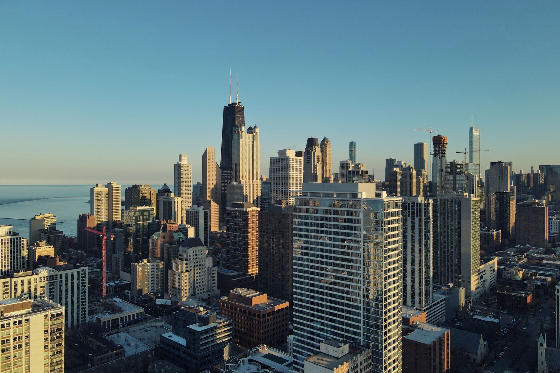 Chicago skyline with business professionals discussing sales data