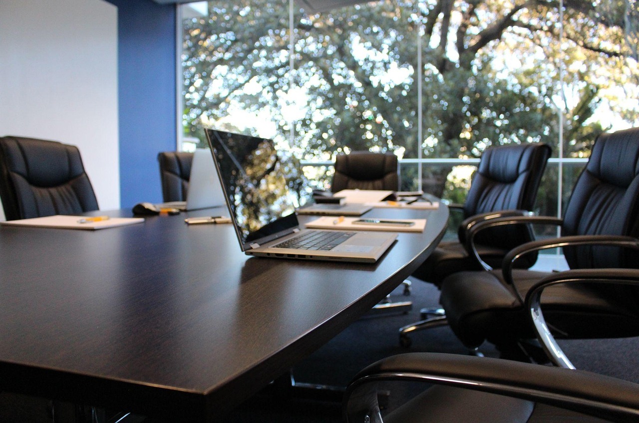 Memphis professionals discussing sales strategy in office