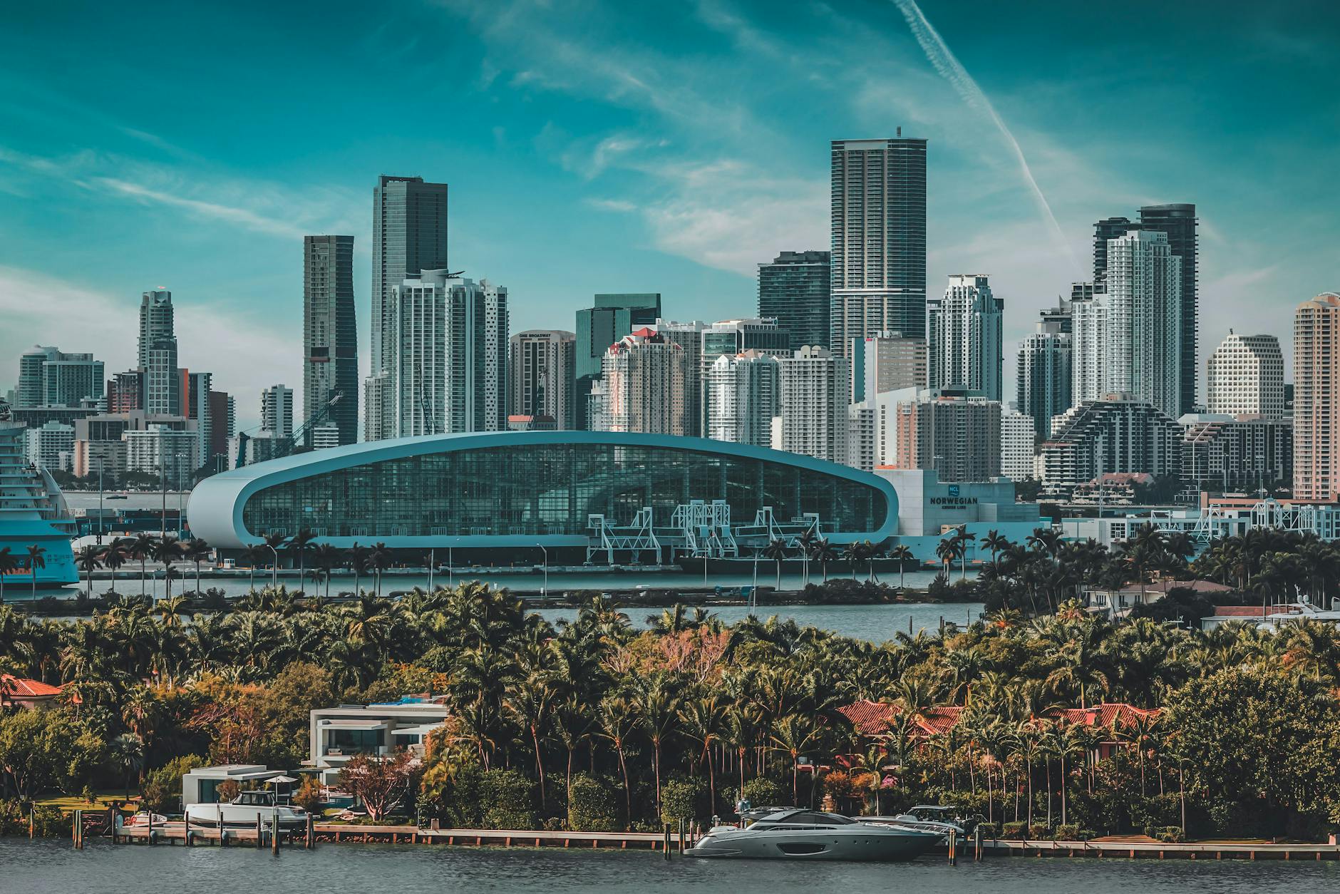 Miami skyline with executives reviewing AI sales dashboard