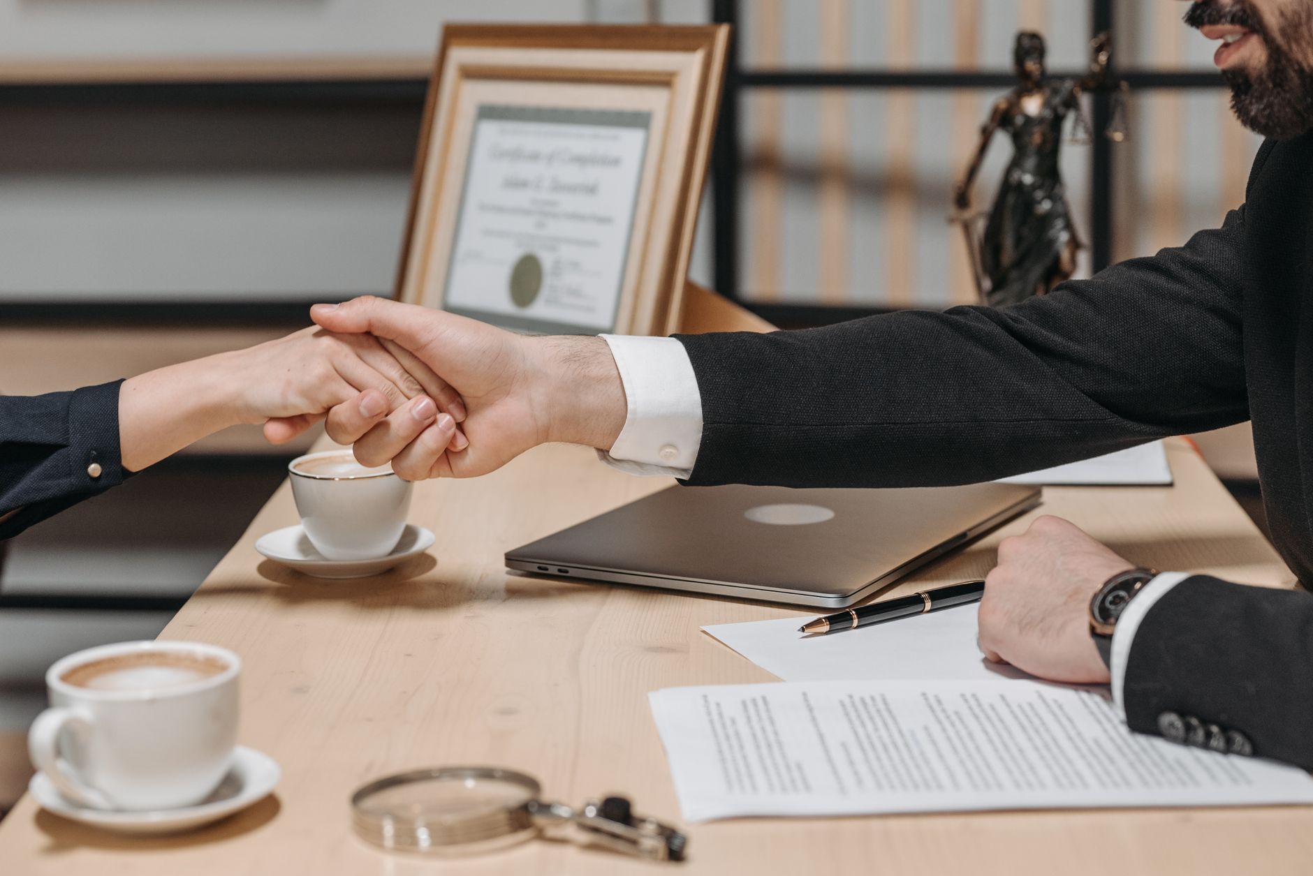 Lawyer discussing case with client in modern office
