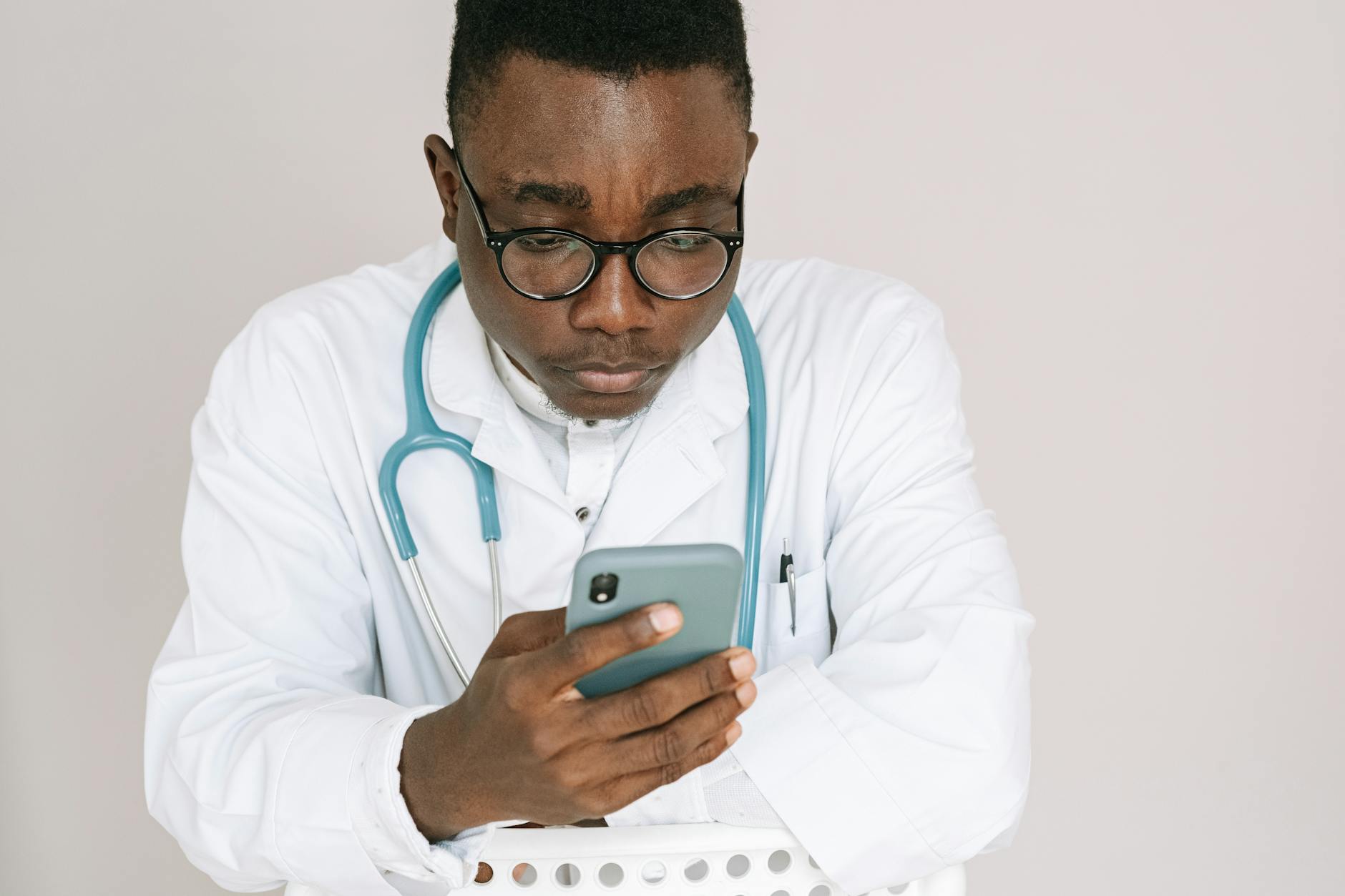 Doctor consulting with AI screen in hospital