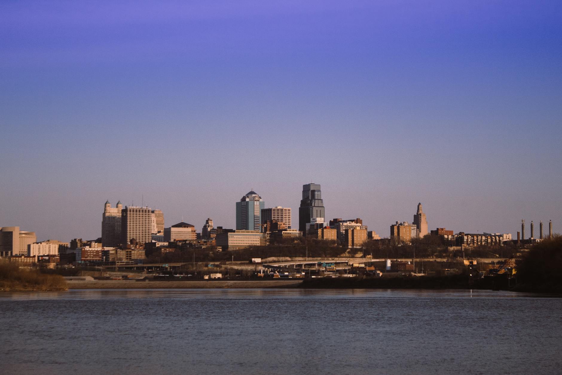 Kansas City skyline with business professionals discussing lead generation
