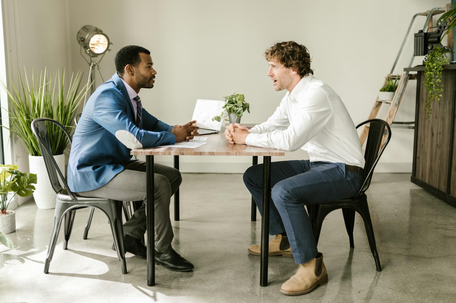 Mesa business professionals discussing AI strategies in modern office