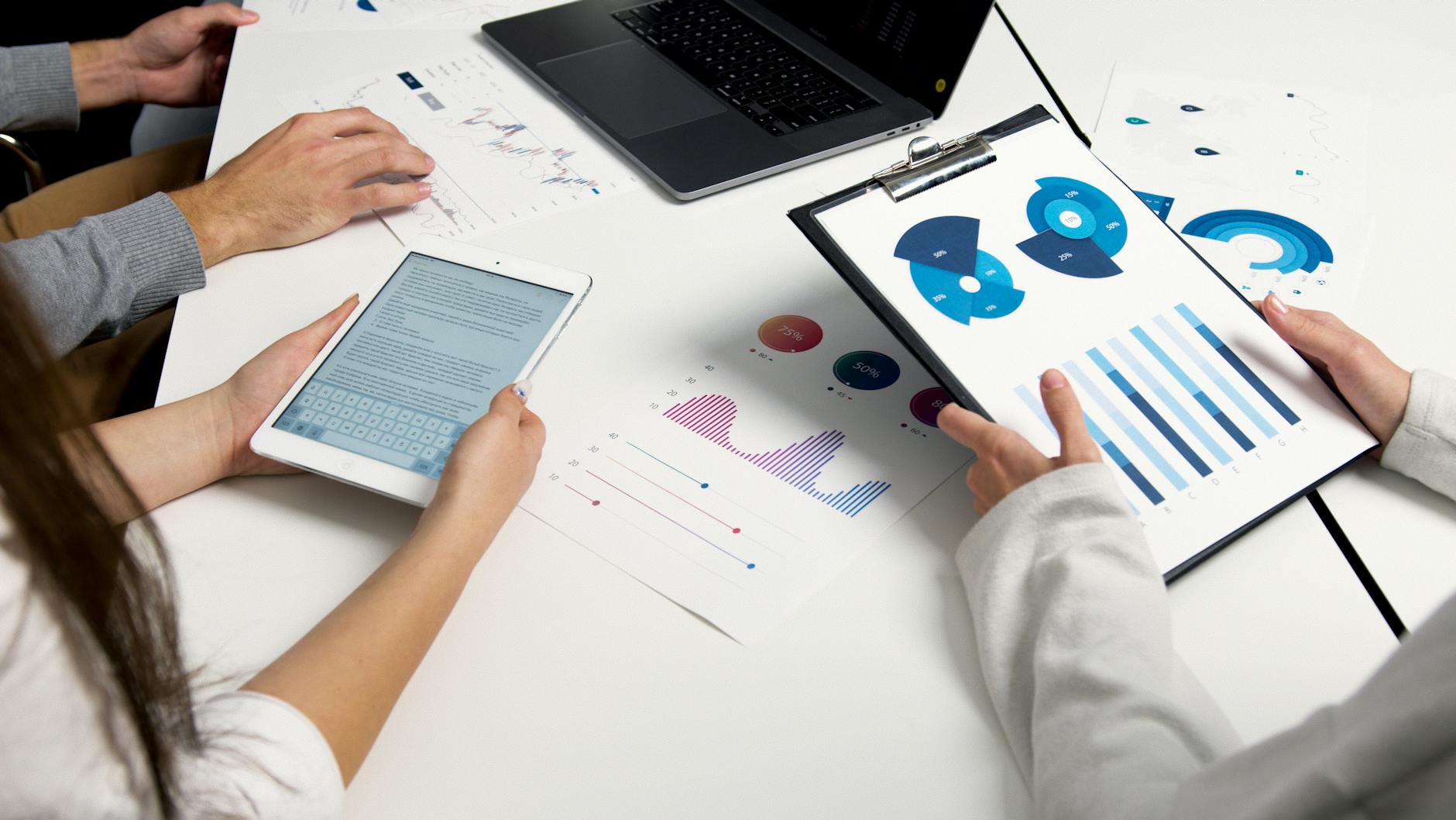 Sales team reviewing AI analytics dashboard