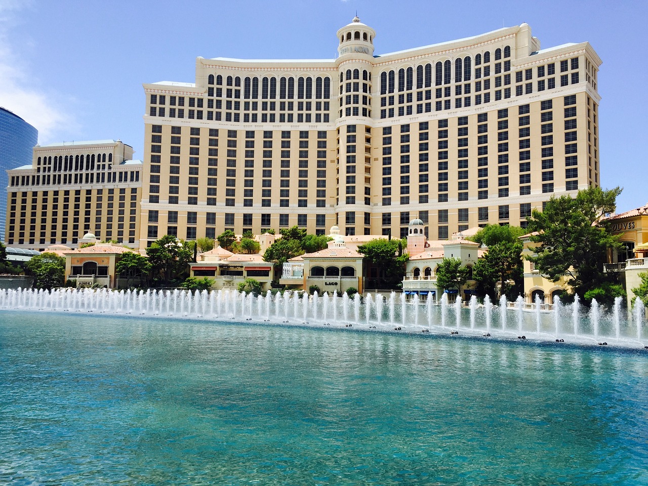Las Vegas Strip hotels at night with digital sales dashboard overlay
