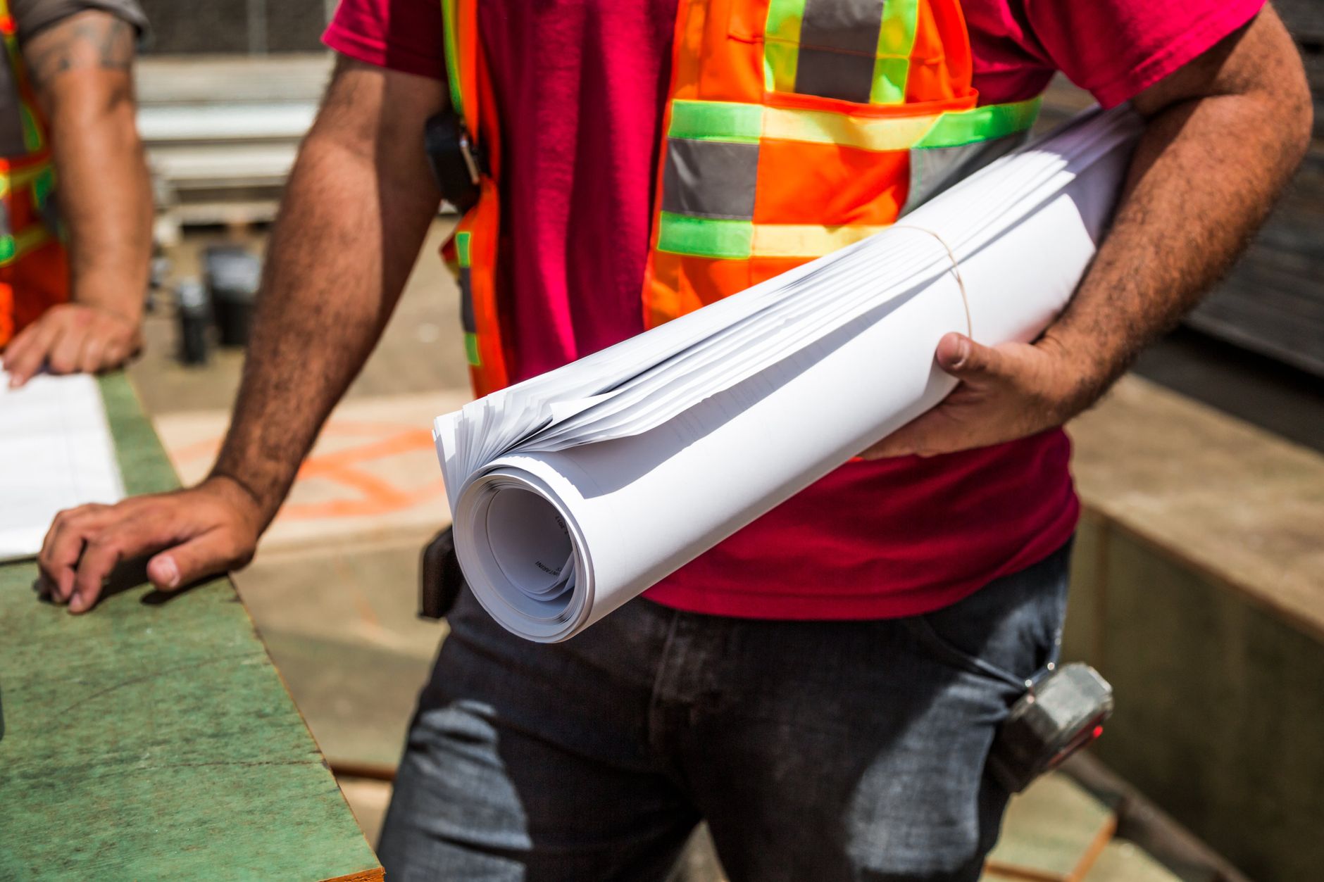 Home improvement professional discussing project plans with homeowner