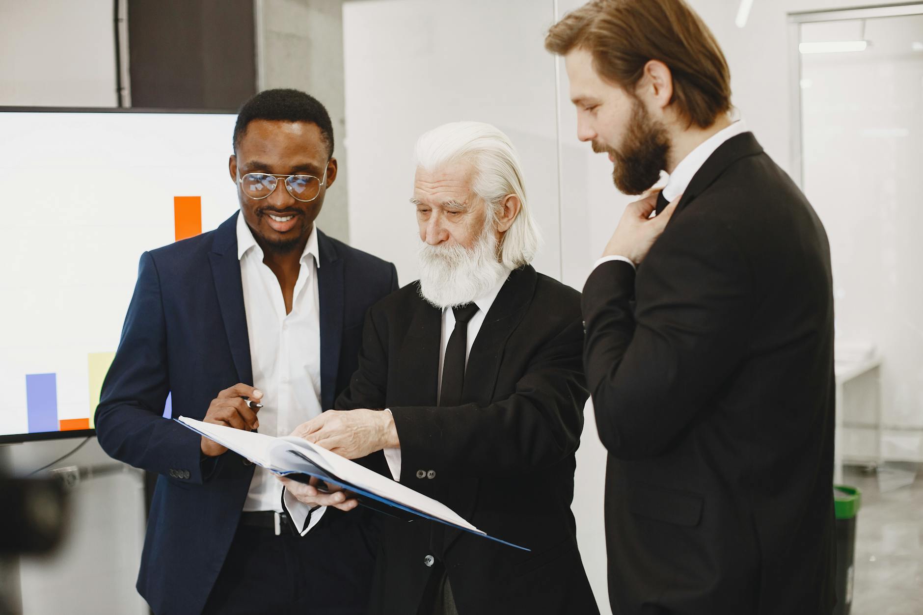 Business team analyzing sales dashboard