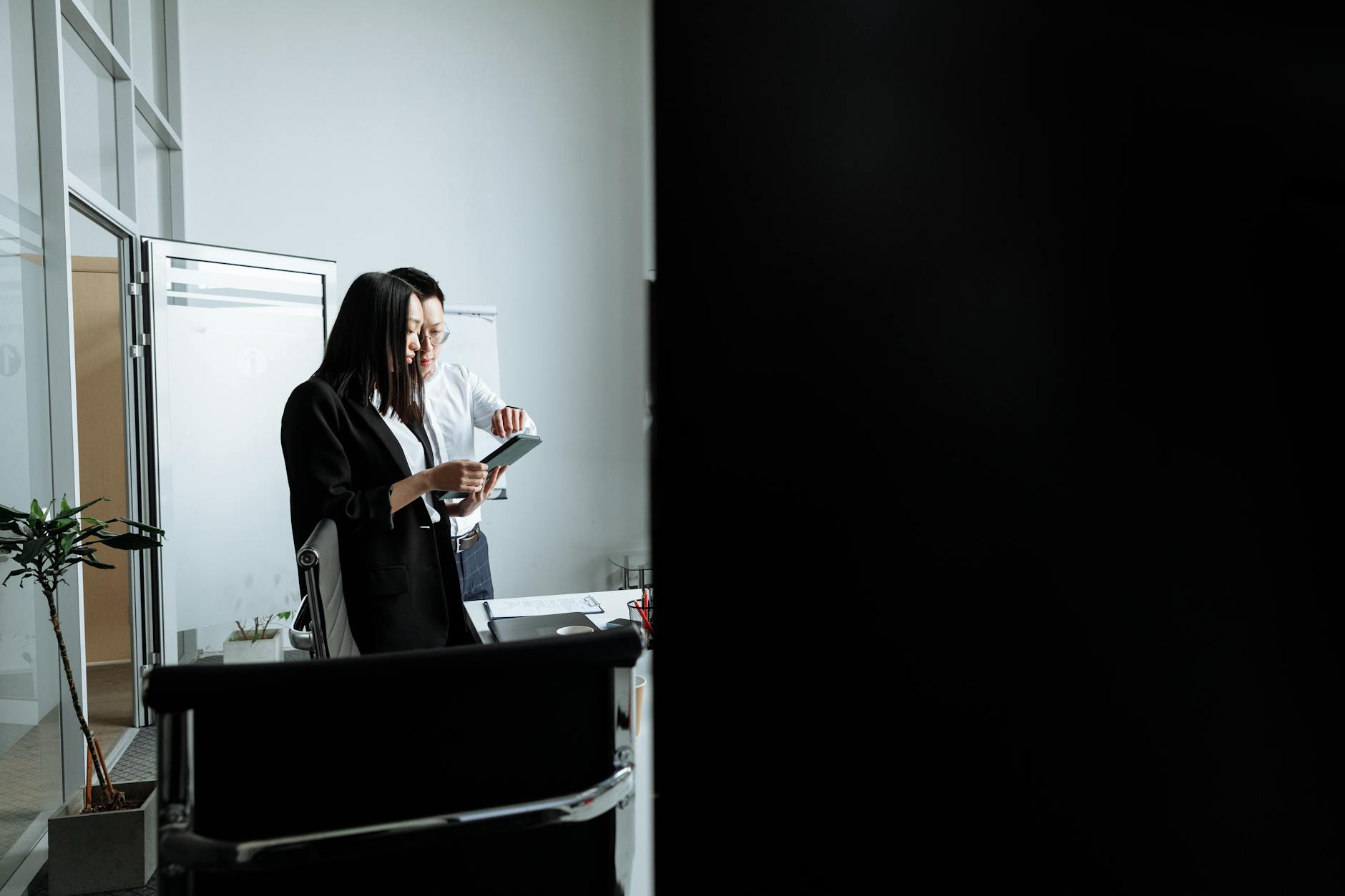 Business professionals discussing corporate travel plans