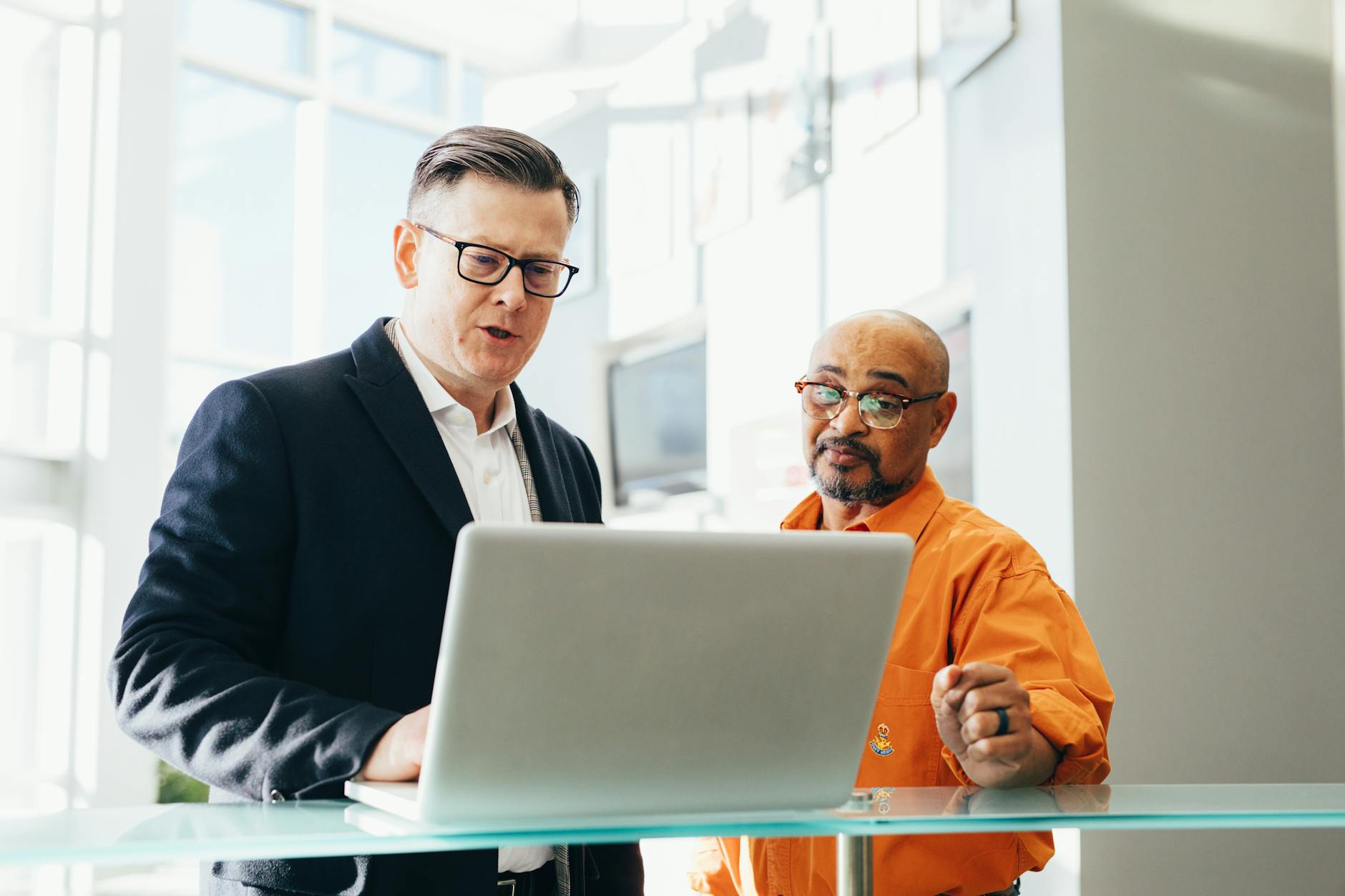 Tulsa professionals using AI sales tools in modern office