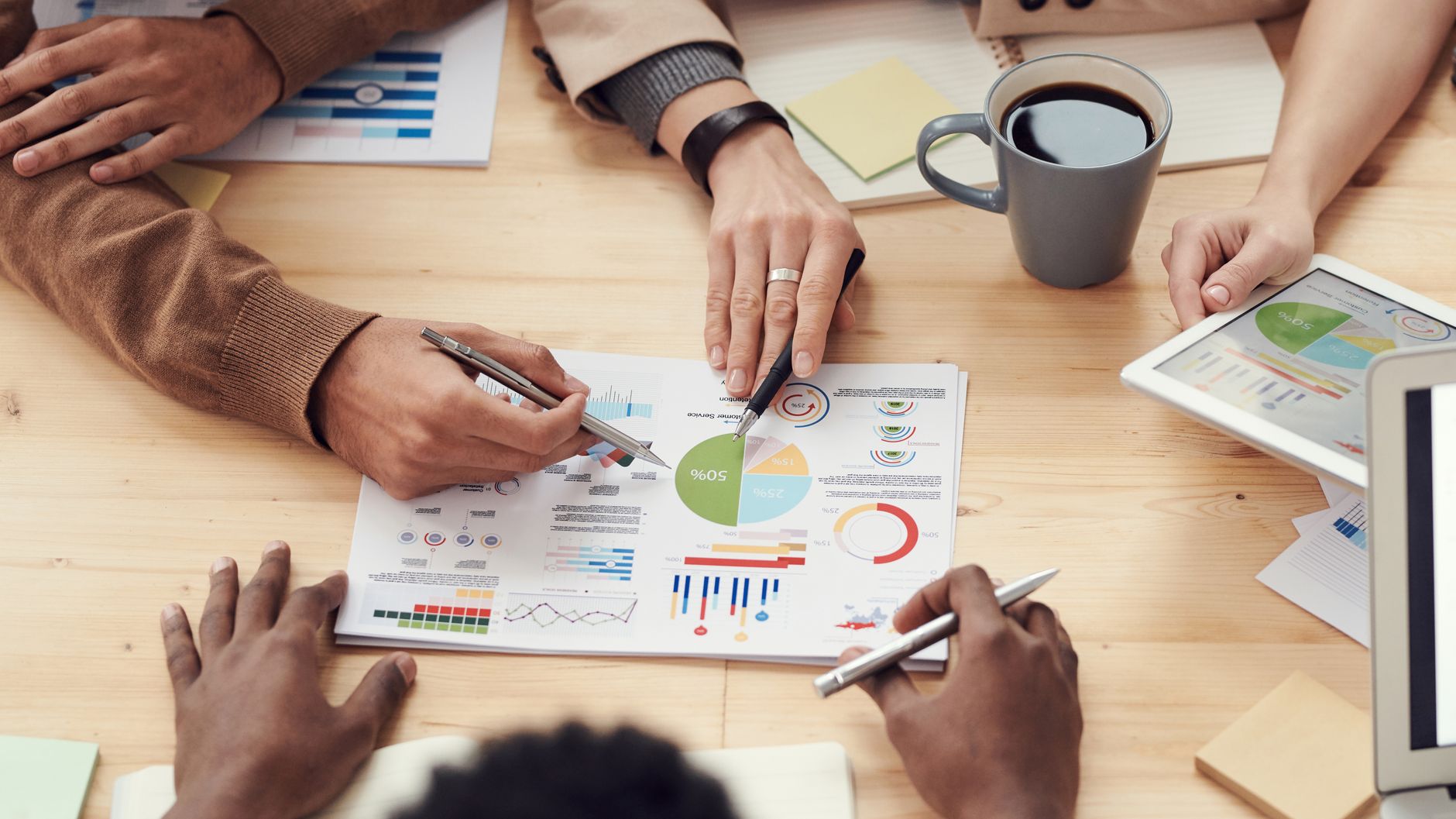 Philadelphia sales team reviewing AI-generated lead intelligence dashboards
