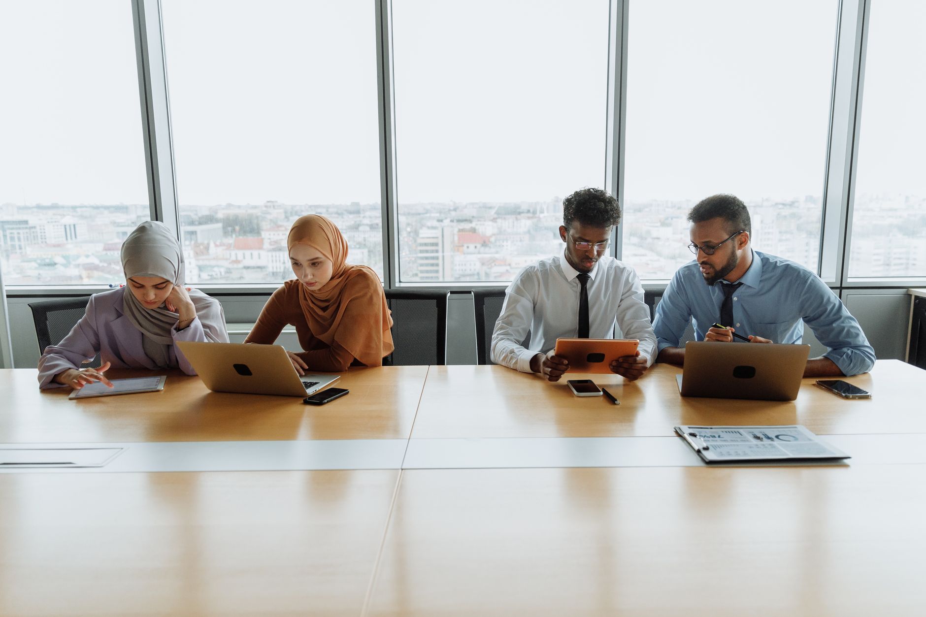 Business professionals discussing strategy in Nashville office