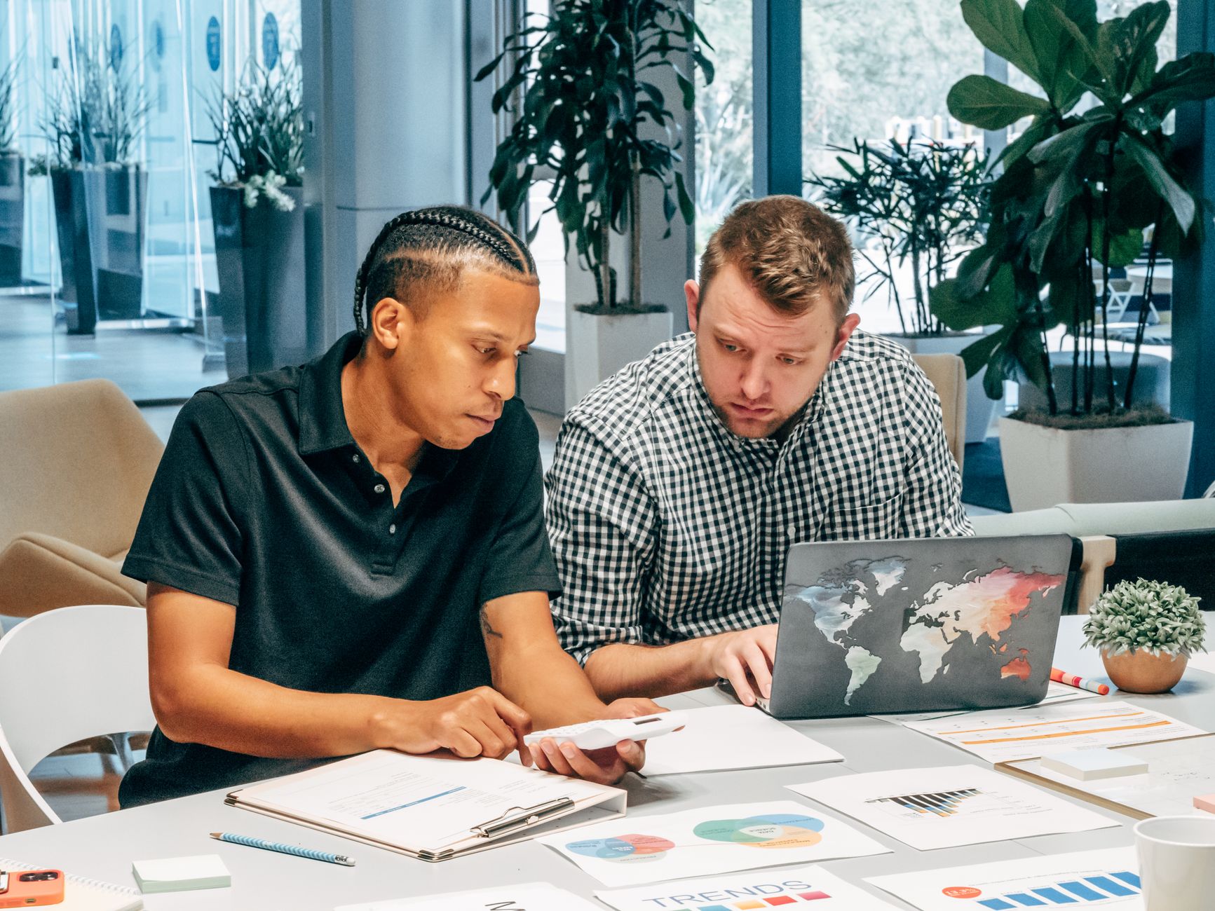Modern office in Minneapolis with a sales team discussing strategies