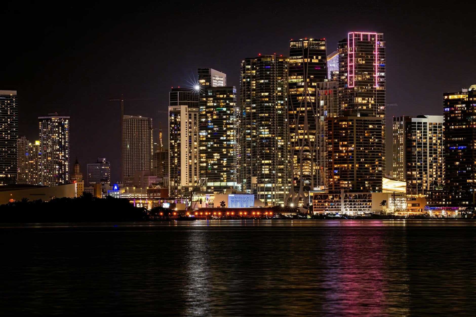 Miami skyline overlaid with rising sales automation charts