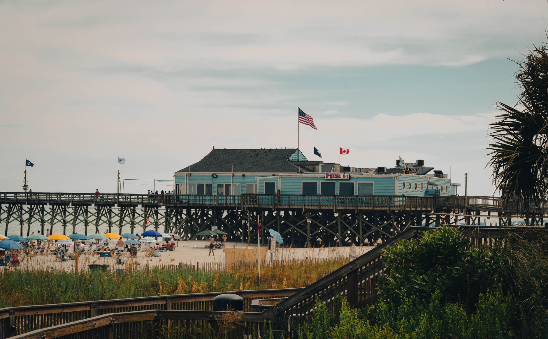 Virginia Beach boardwalk filled with tourists in summer