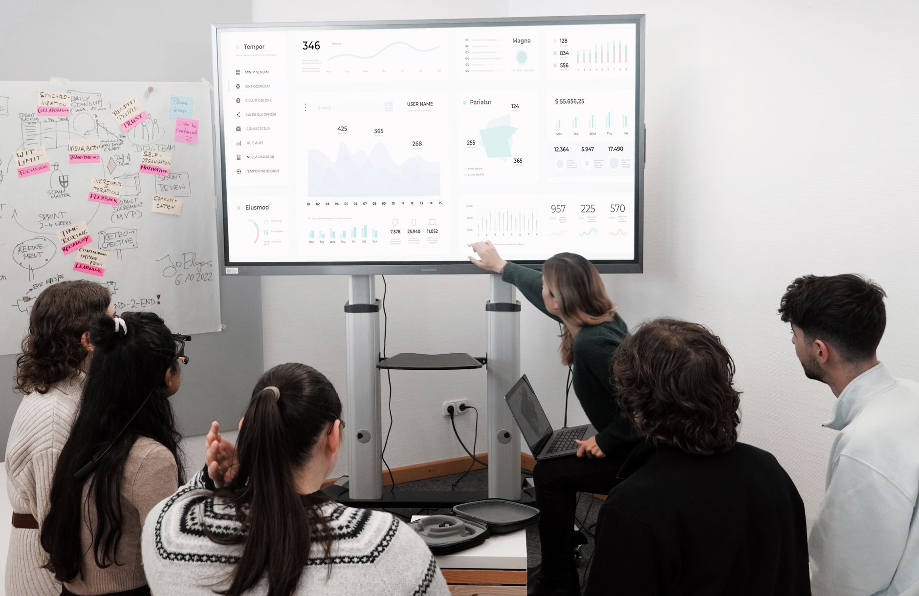 Marketing team analyzing GEO performance on a dashboard
