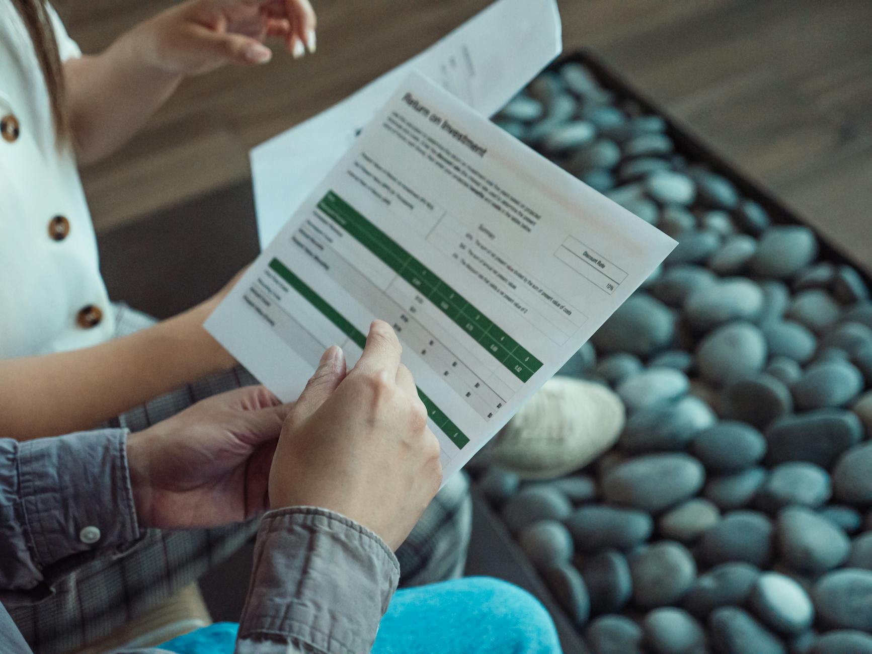 Contractor team analyzing AI quote on tablets