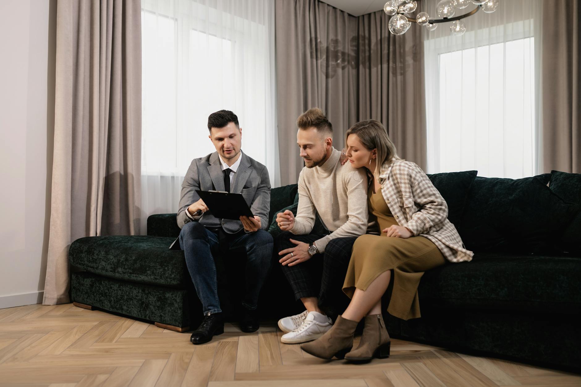 Sales team reviewing AI sales dashboard in modern office