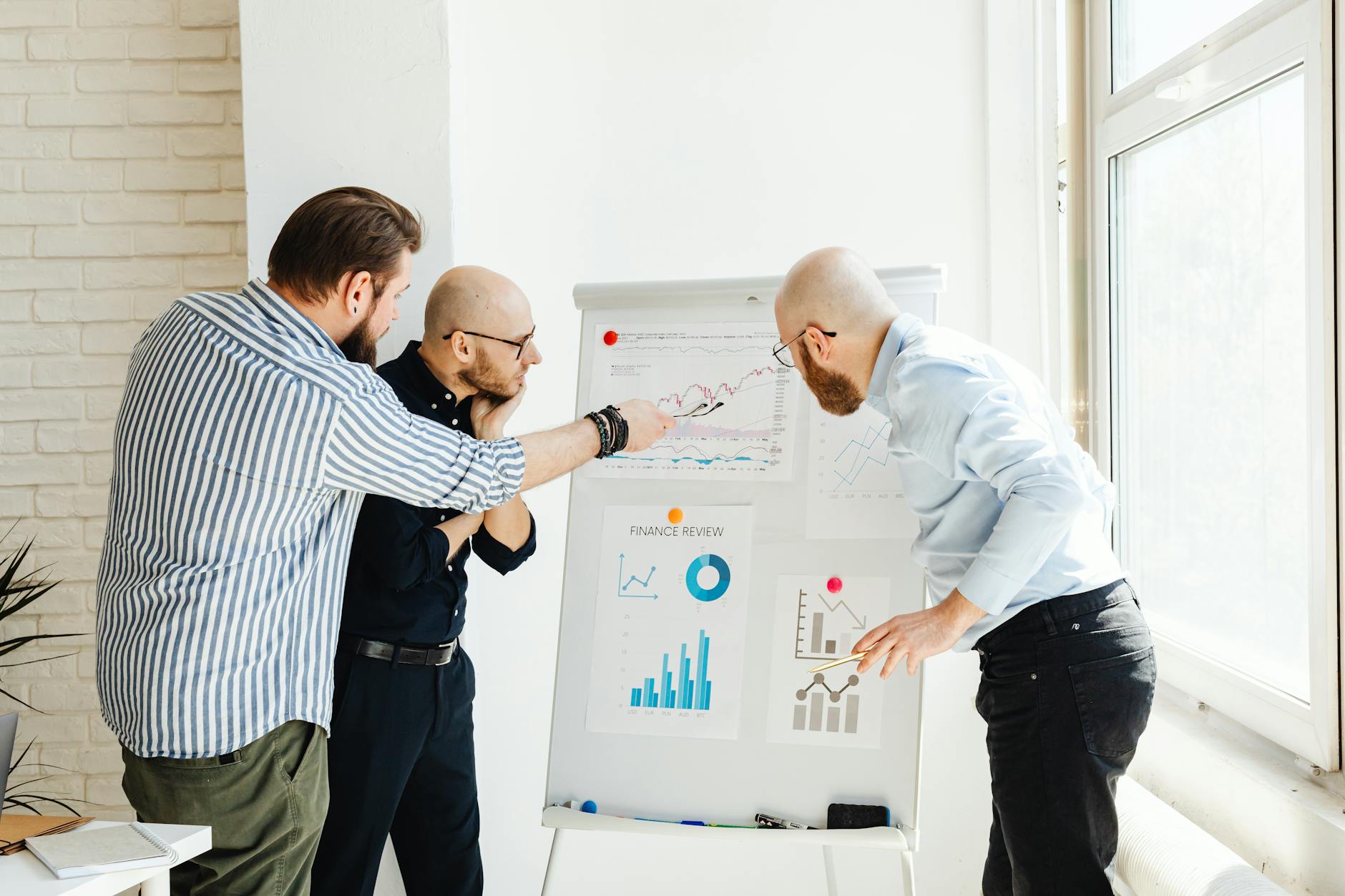 Sales team reviewing AI qualified accounts on screen