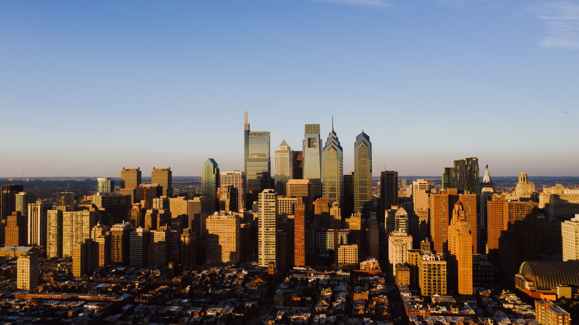 Philadelphia skyline with business professionals meeting