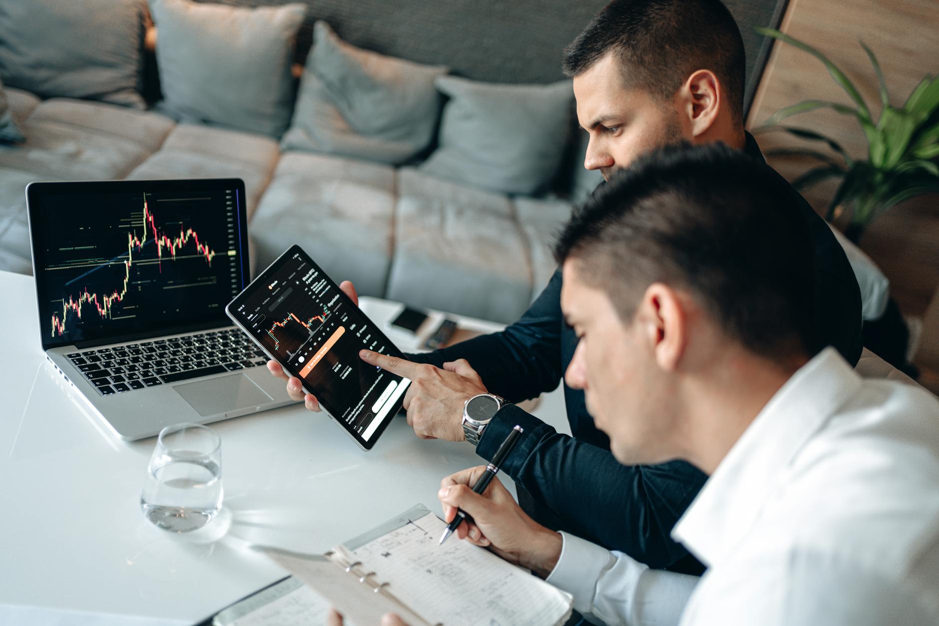 Houston professionals analyzing sales data