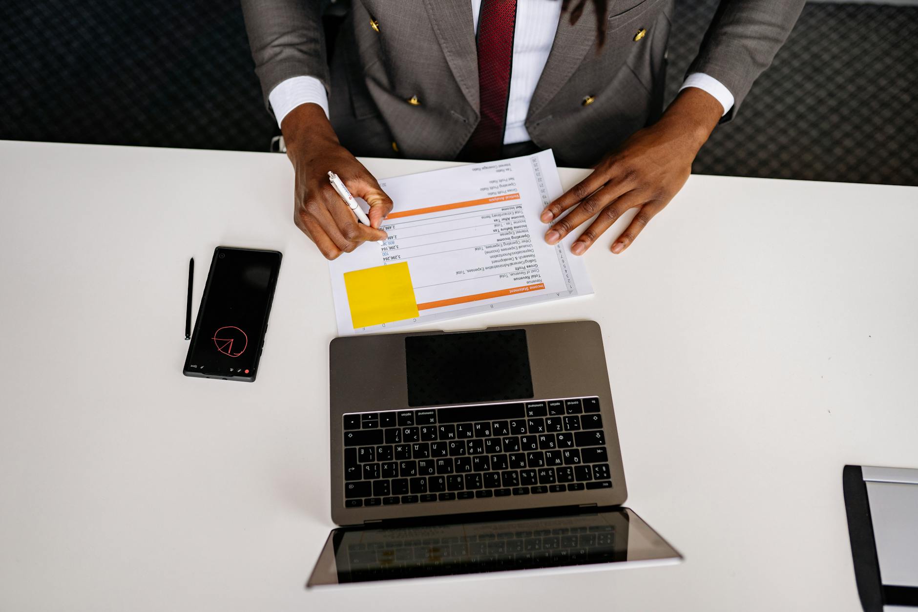Phoenix business owner analyzing leads on laptop