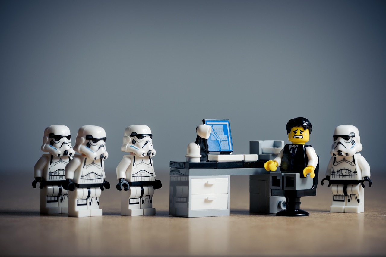Modern customer service team in Milwaukee office using computers