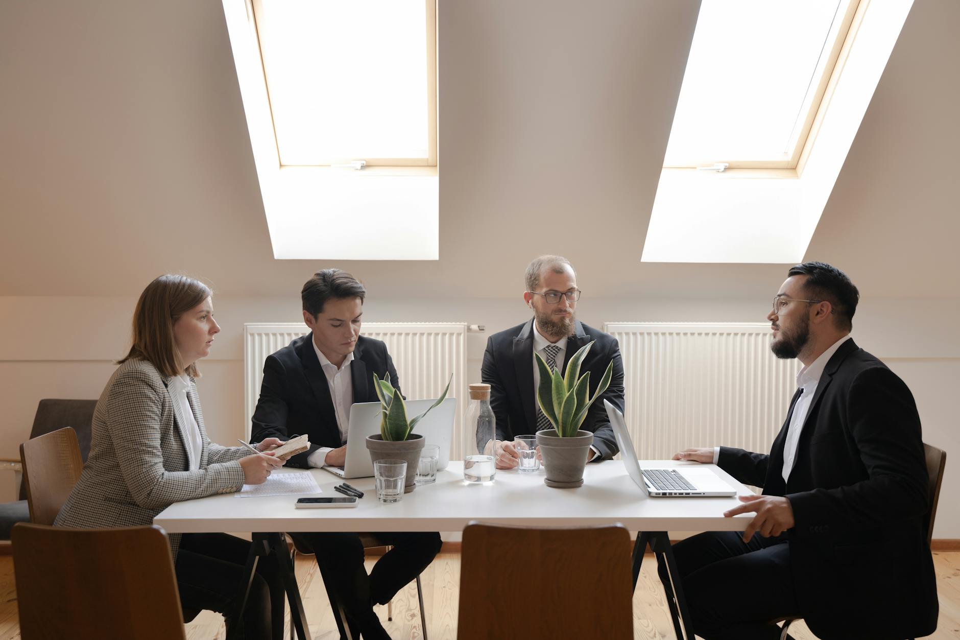 Executives in strategy meeting boardroom