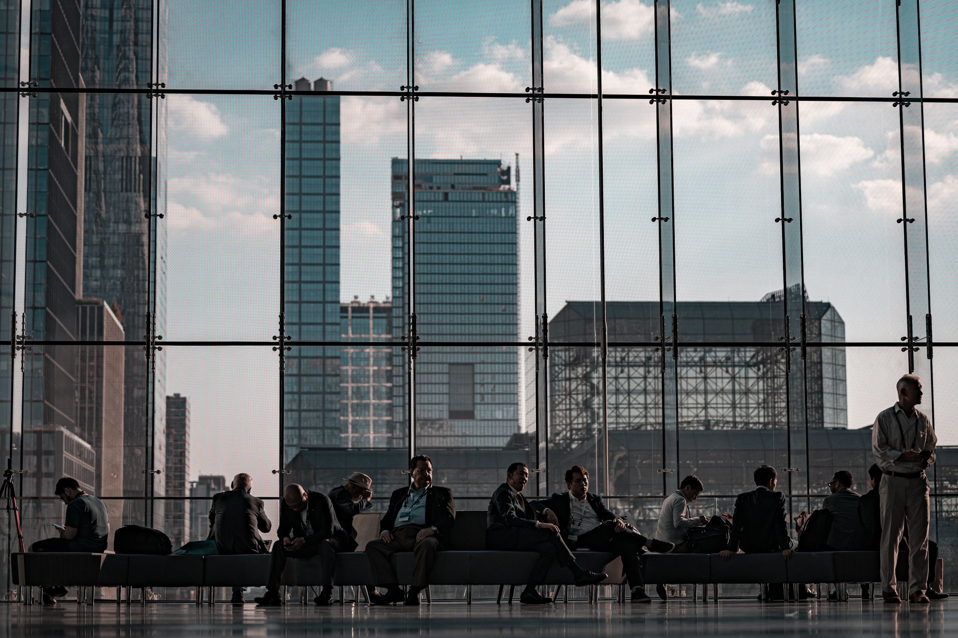 Chicago skyline with business professionals at meeting table