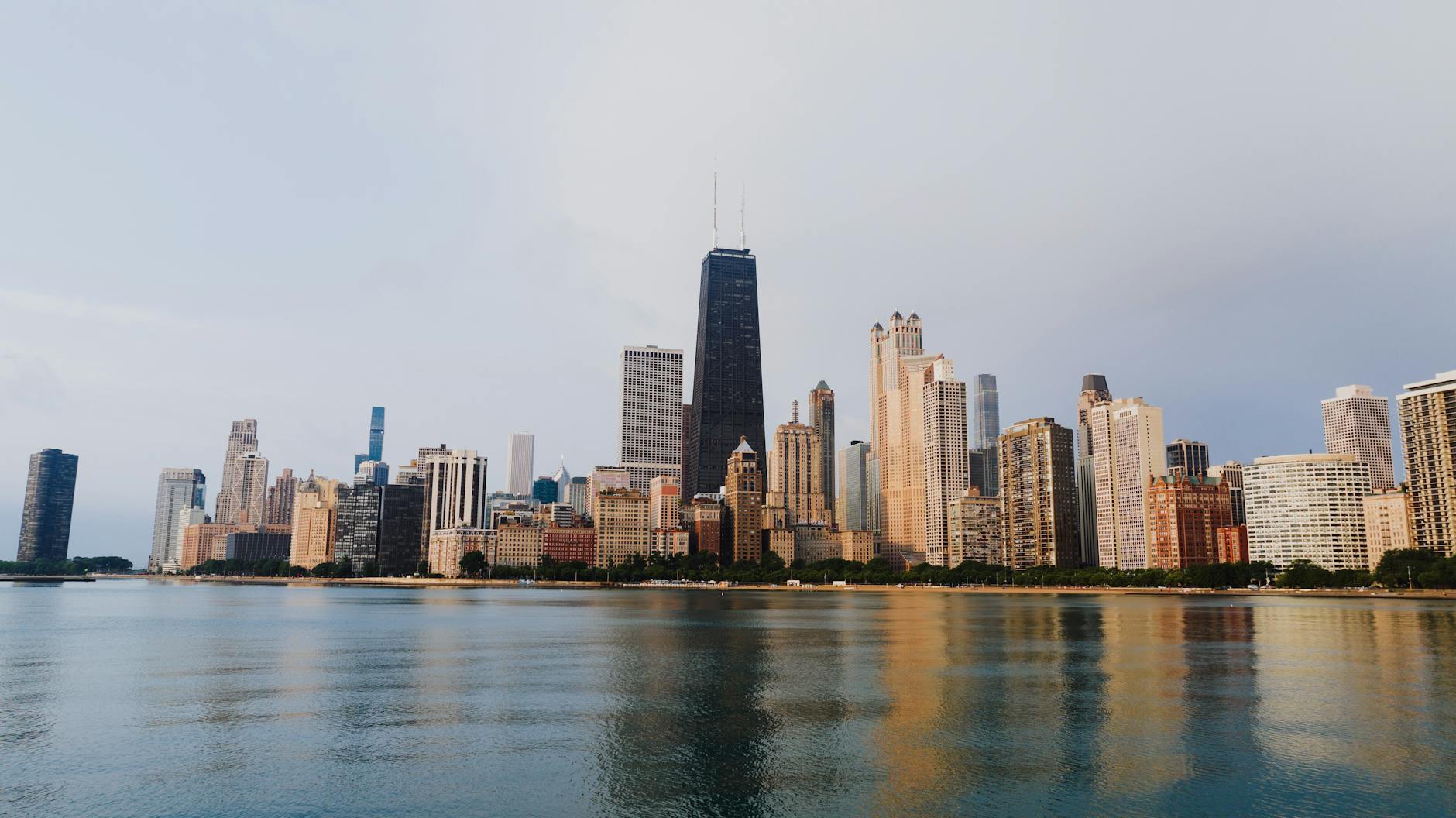 Chicago skyline with business professionals discussing sales