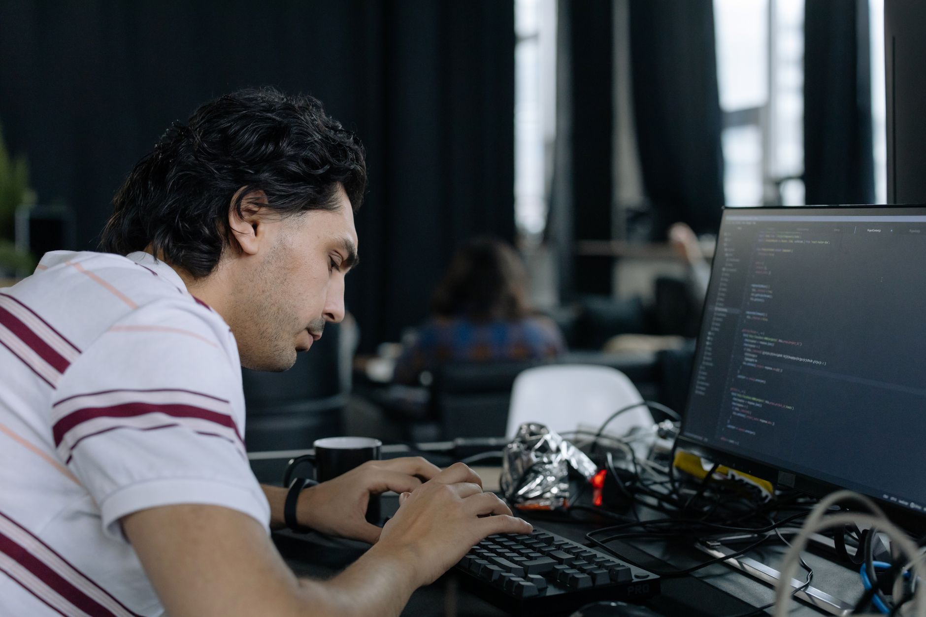 Developer validating JSON-LD schema using a validation tool on a laptop