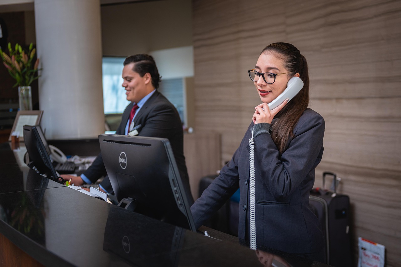 Busy Philadelphia medical receptionist handling calls