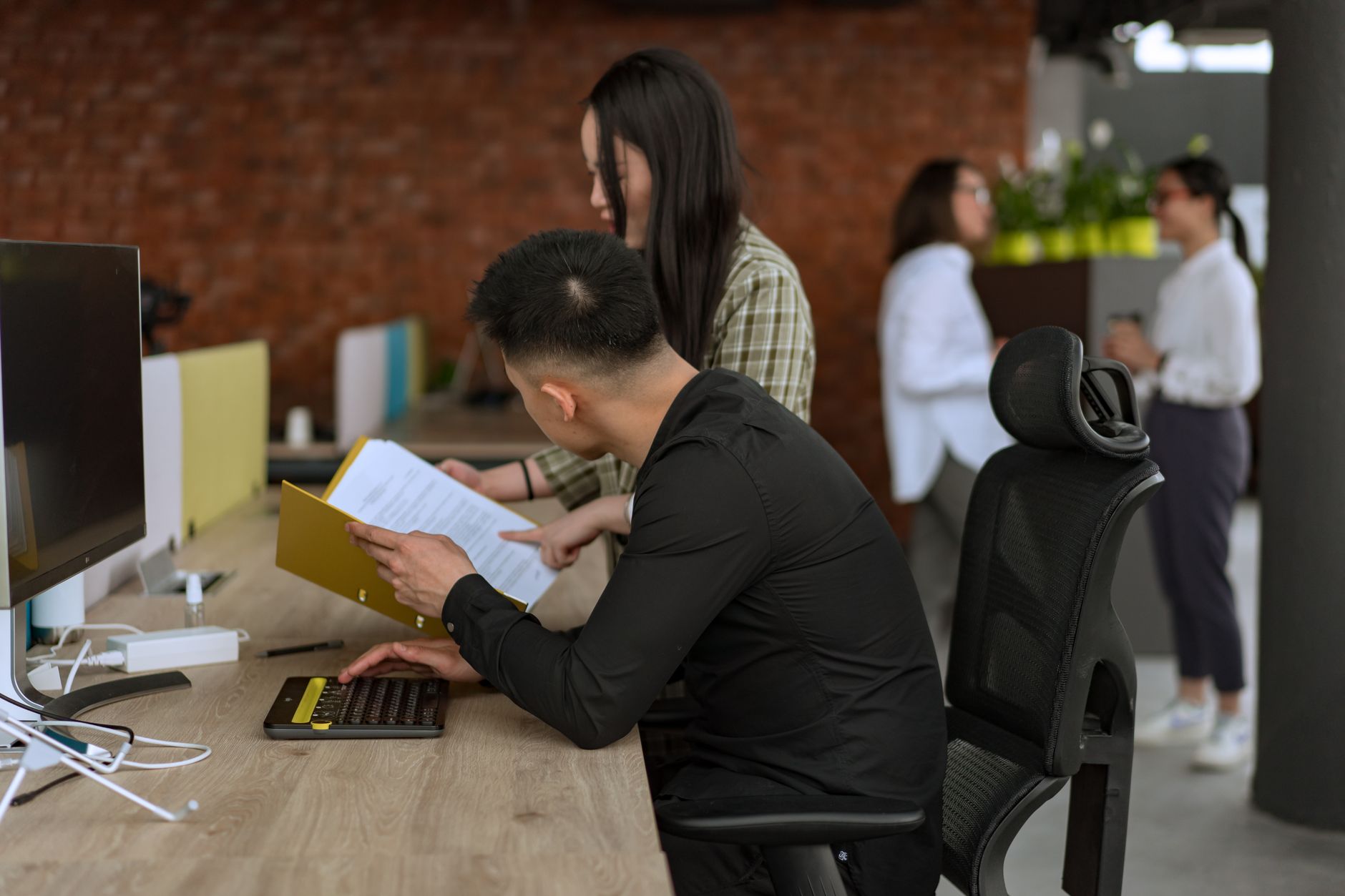 Sales team reviewing an AI-powered dashboard during a meeting