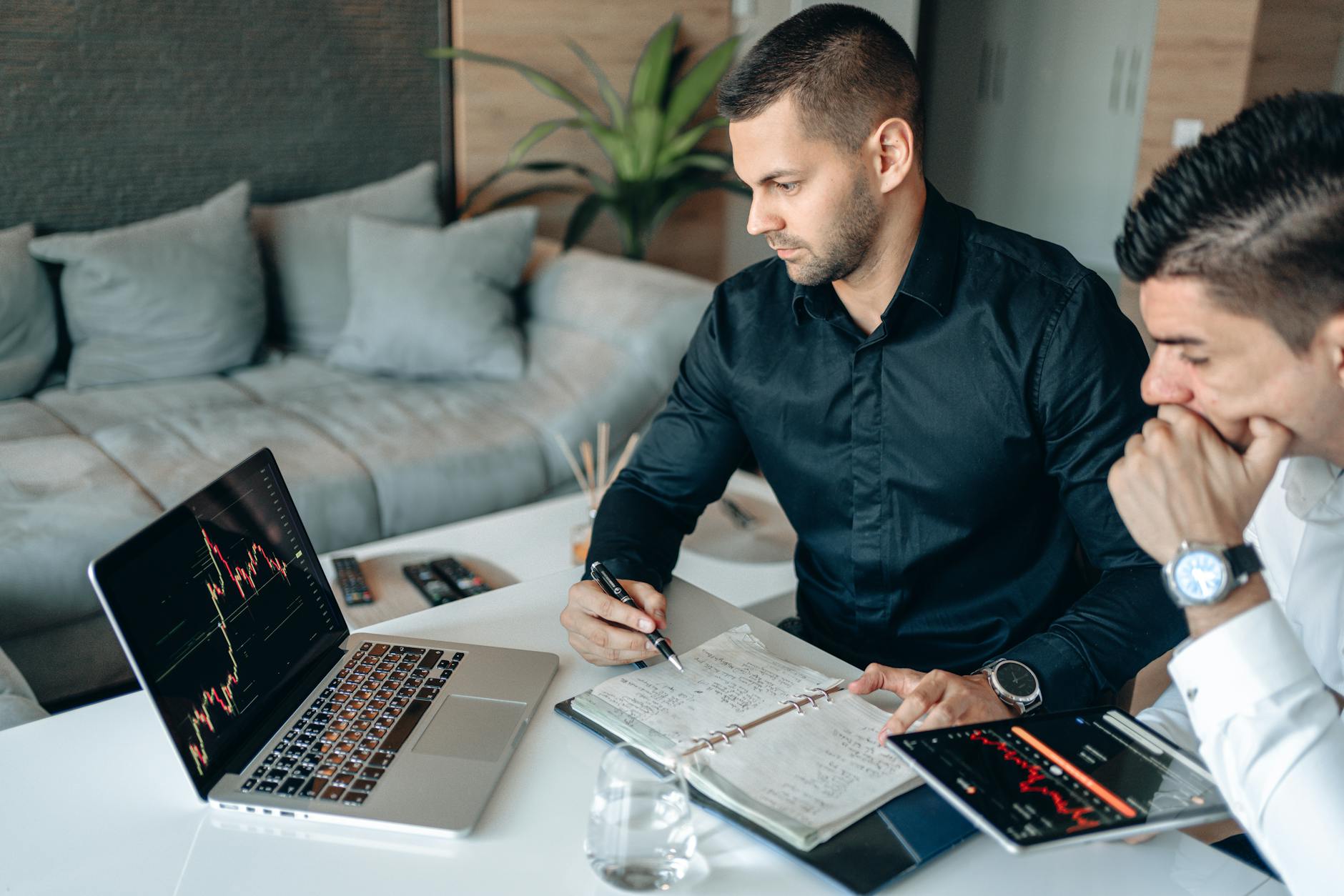 Business team analyzing sales charts in Vegas office