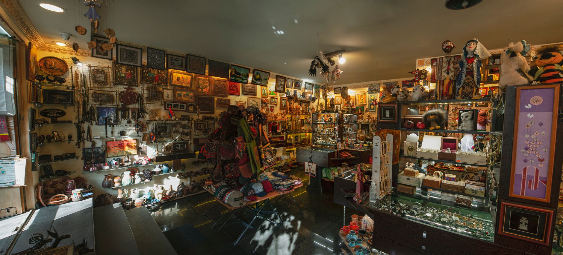 Vibrant interior showcasing diverse souvenirs, arts, and crafts.