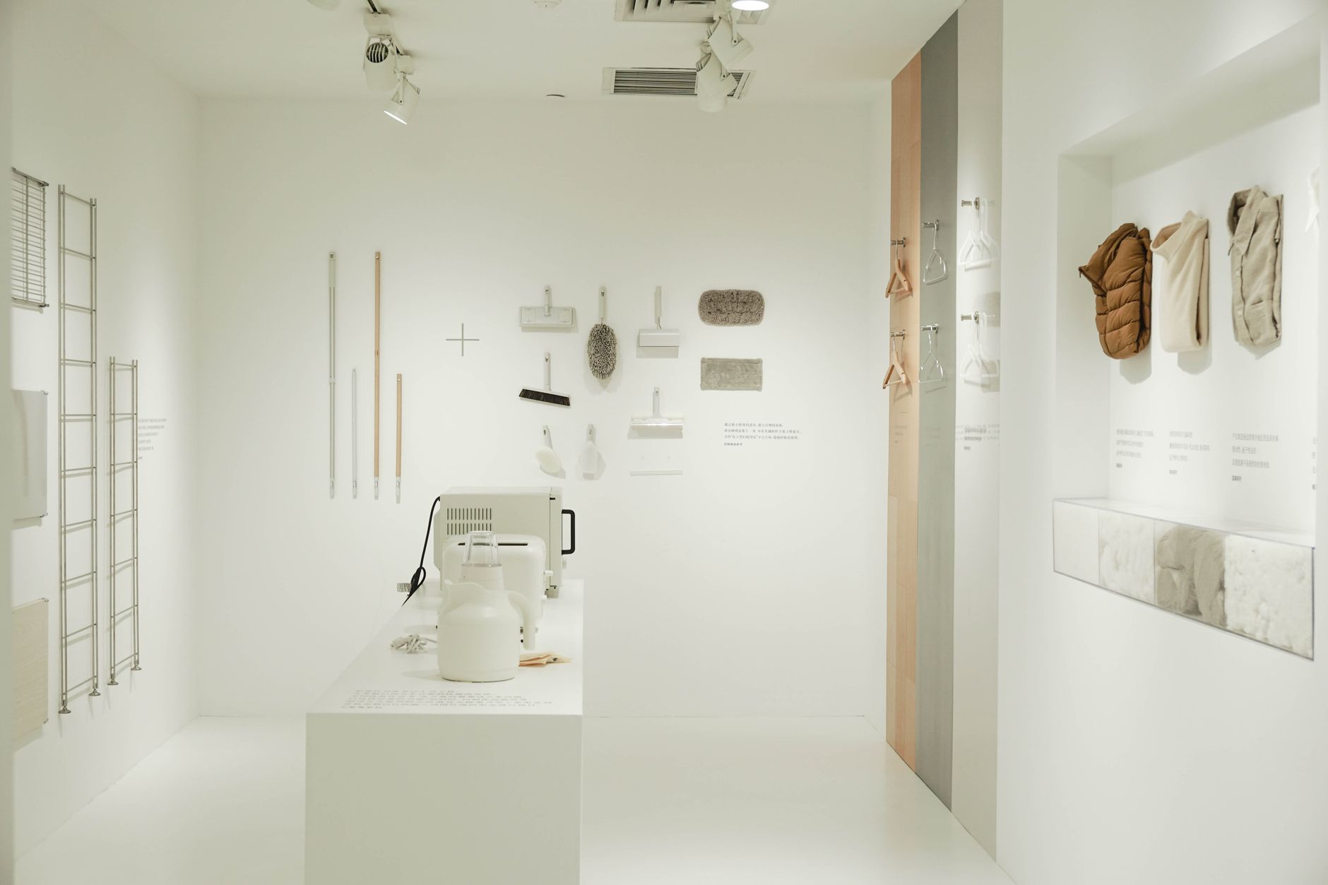 A bright, minimalist room showcasing contemporary white interior decor and design elements.