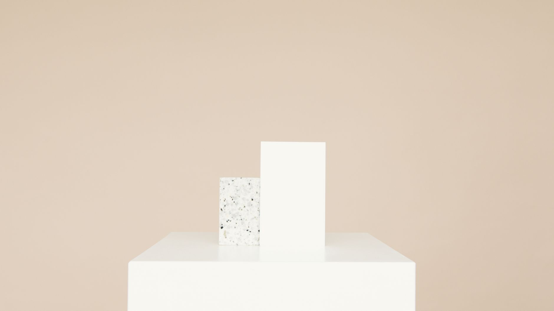 Simple minimalist mockup featuring two blocks on a neutral background.