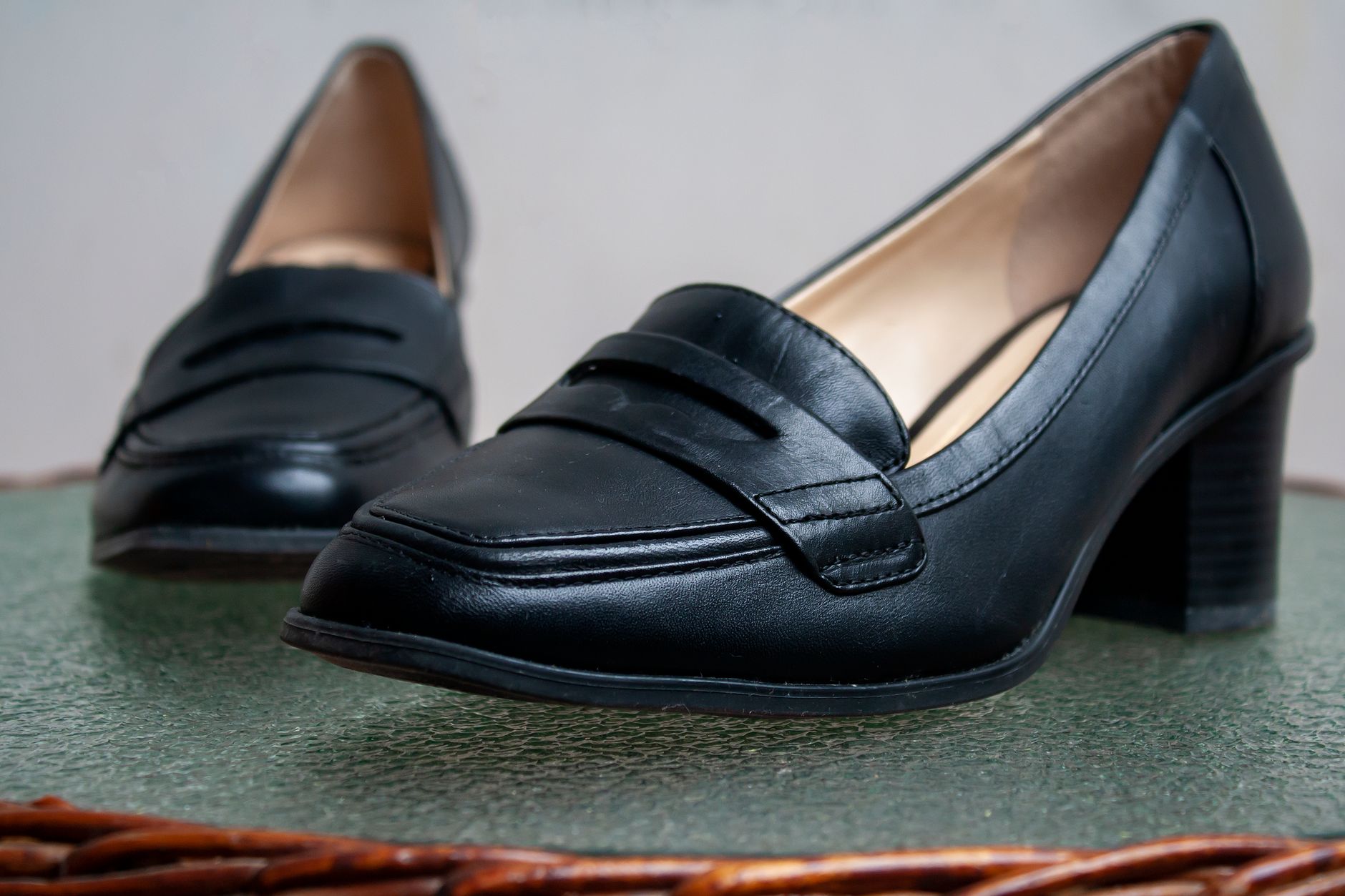 Close-up of stylish black leather women's loafers, perfect for fashion-forward styling.