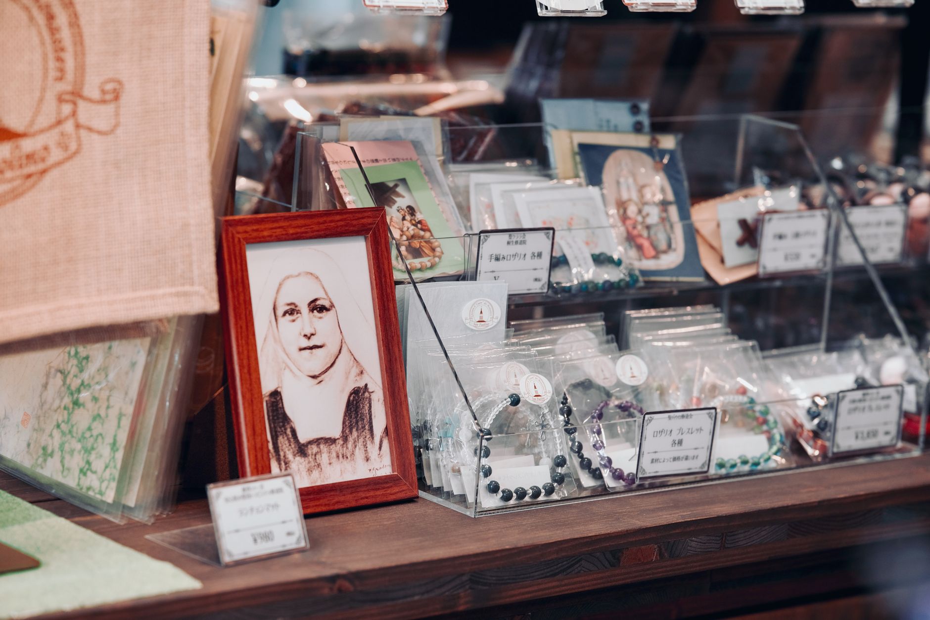 A detailed display of vintage items in a shop in Shinjuku City, Tokyo showcasing artistic cards and souvenirs.